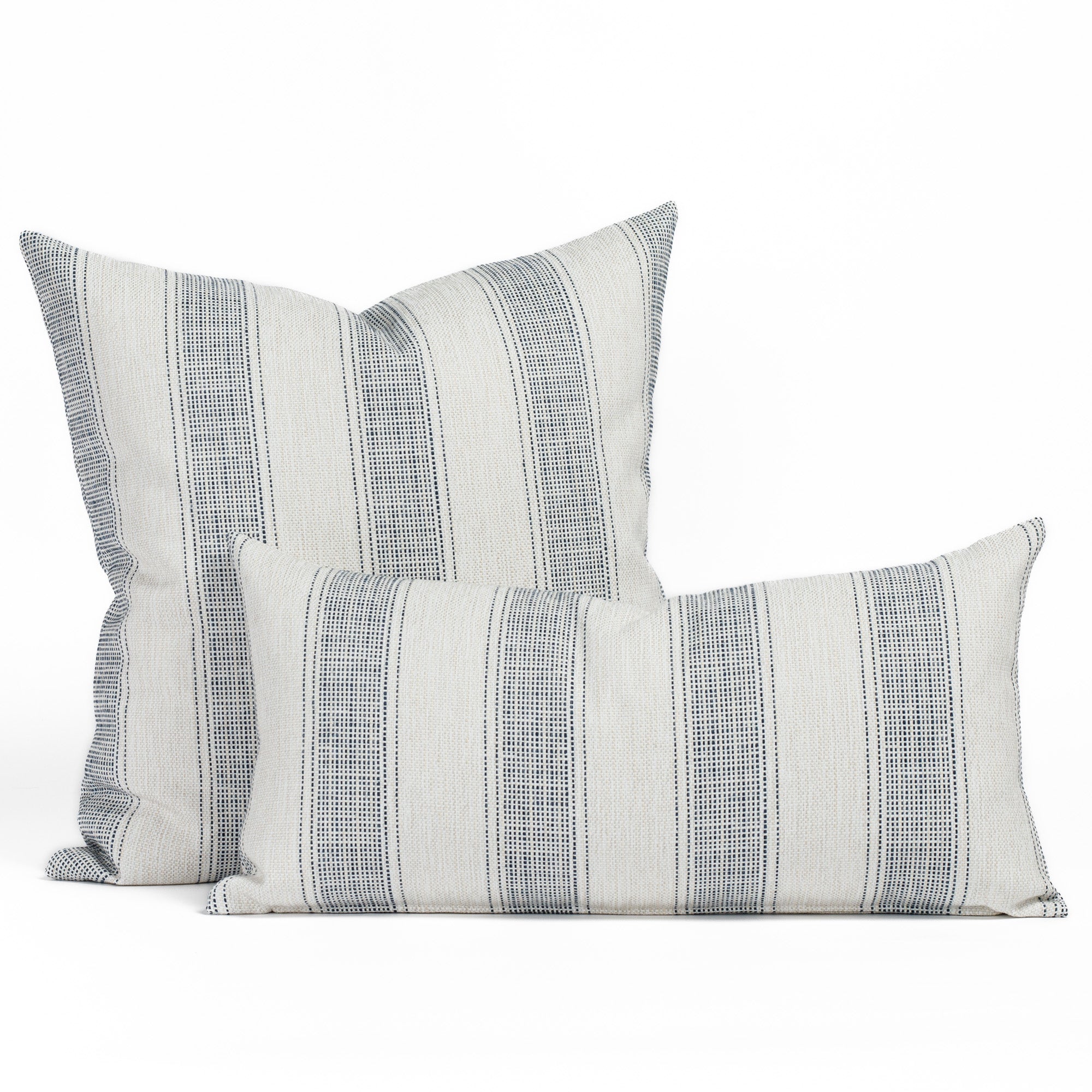 Revitalize Denim 22x22 pillow paired with Revitalize Denim 12x24 lumbar pillow.