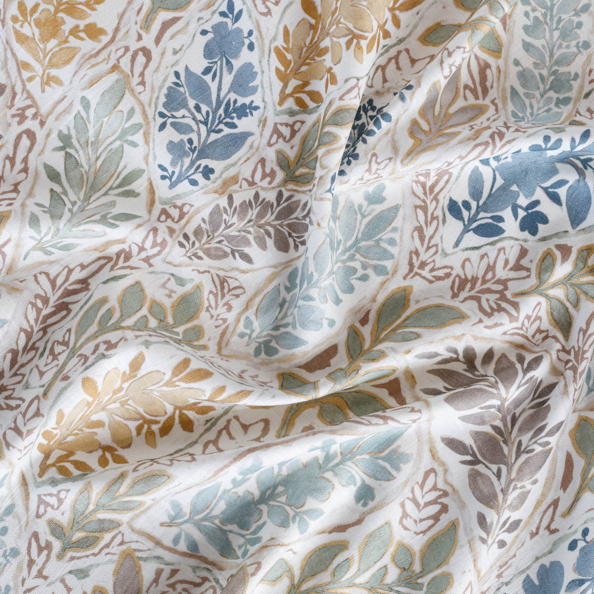 a watery multicoloured floral garden print linen blend fabric