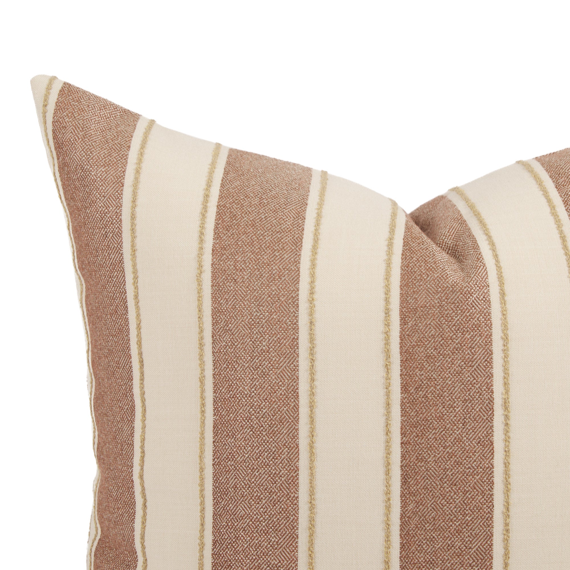Close up of Tonic Living Sentiment outdoor pillow showing terracotta and beige stripe detail.
