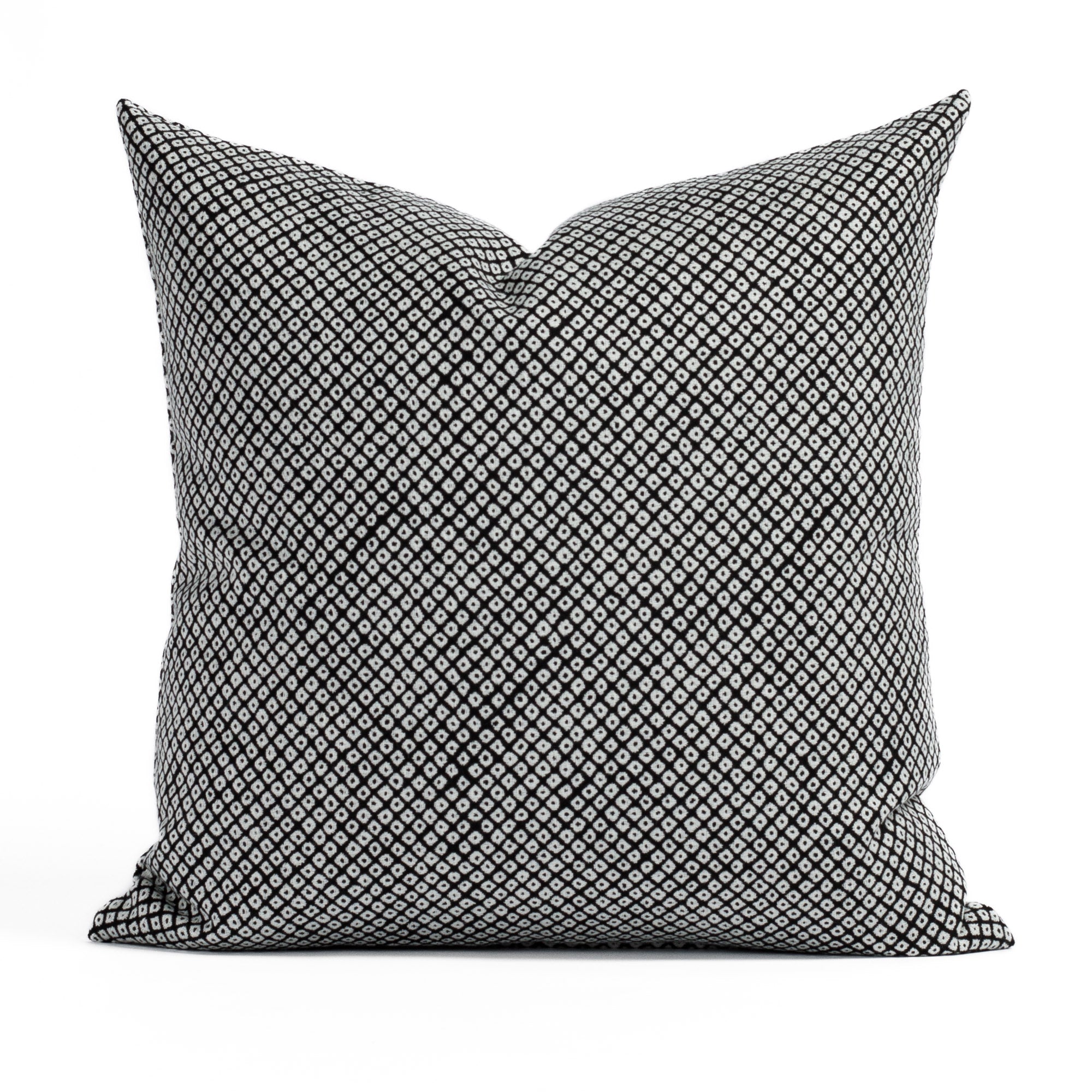 Shibori Classic 20x20 Indoor/Outdoor Pillow from Tonic Living, a black and white pillow with a Japanese-style block print pattern.