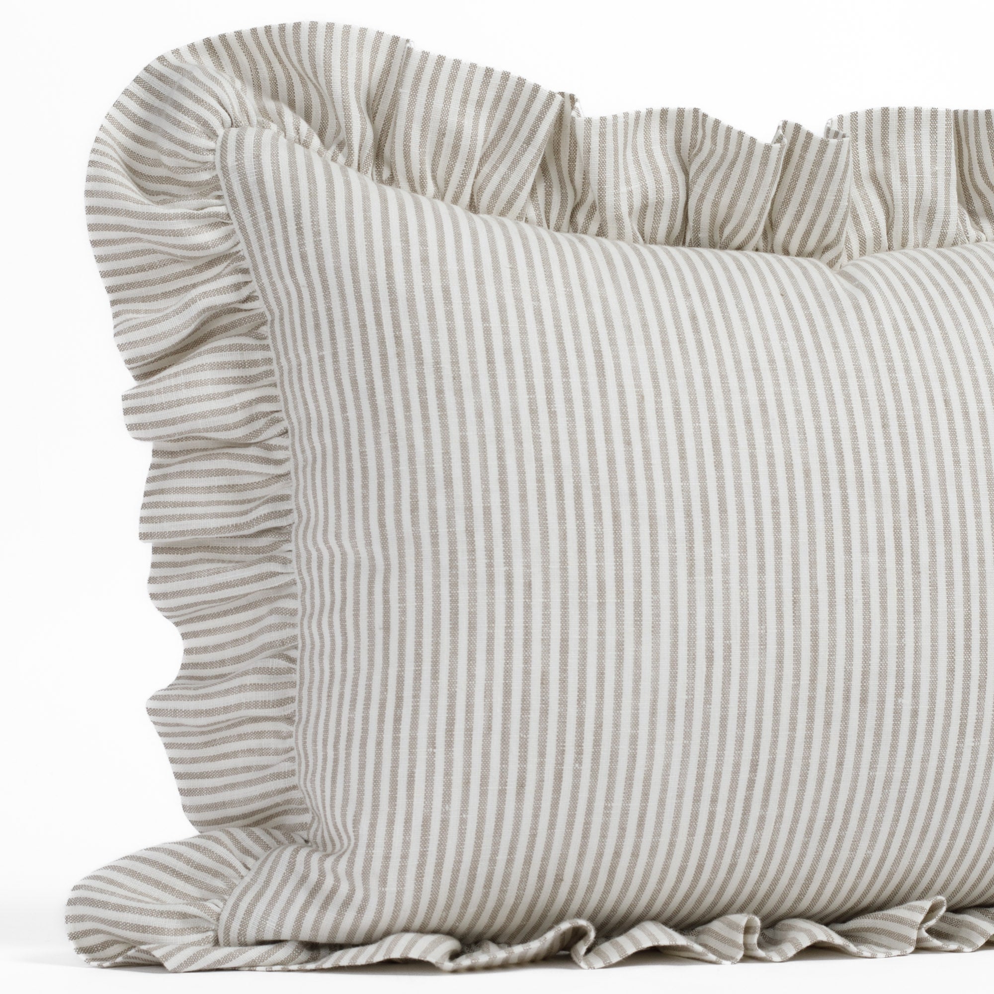 Close-up of the Siena Buff ruffled lumbar toss cushion by Tonic Living, showing the stitched vertical pinstripe and airy 100% linen weave with fine slub texture.