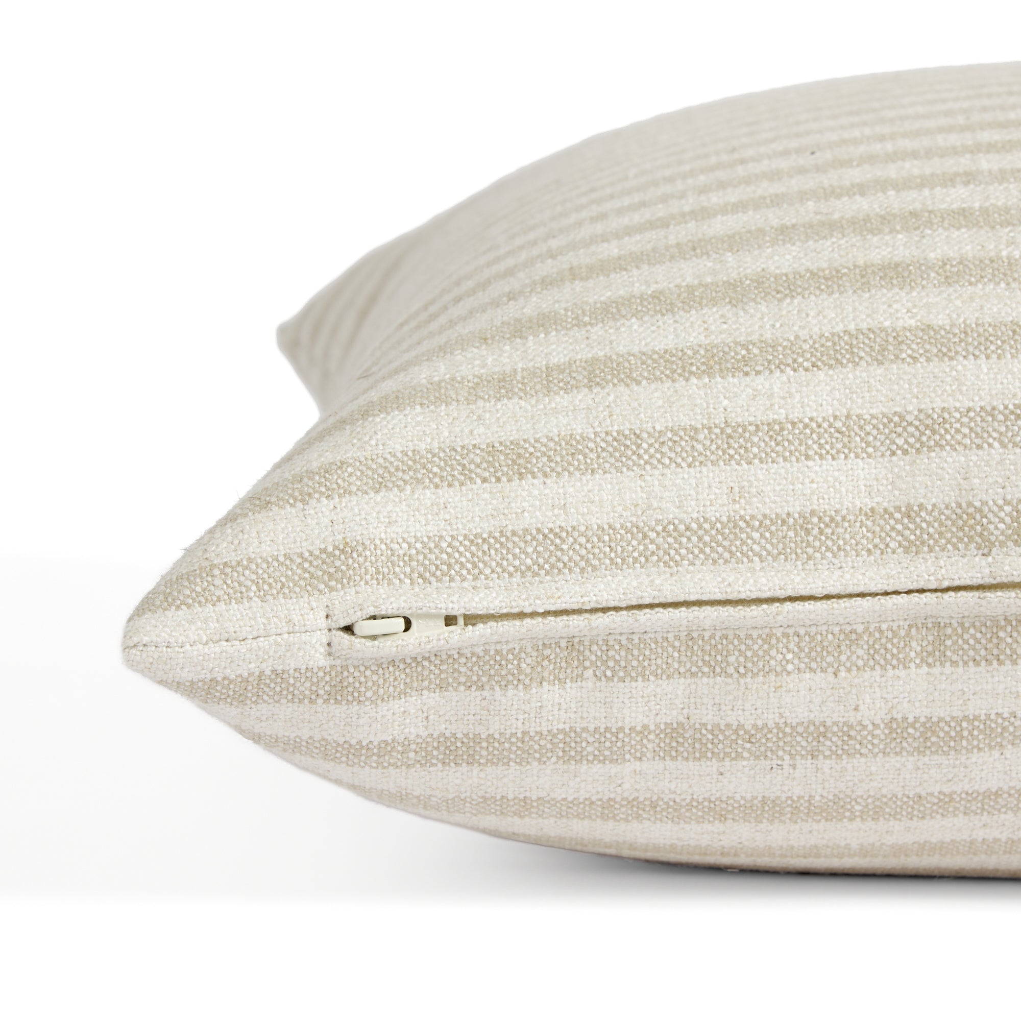 Side zipper detail of Tonic Living Somerset Stripe 22x22 throw pillow in sand and beige stripe.