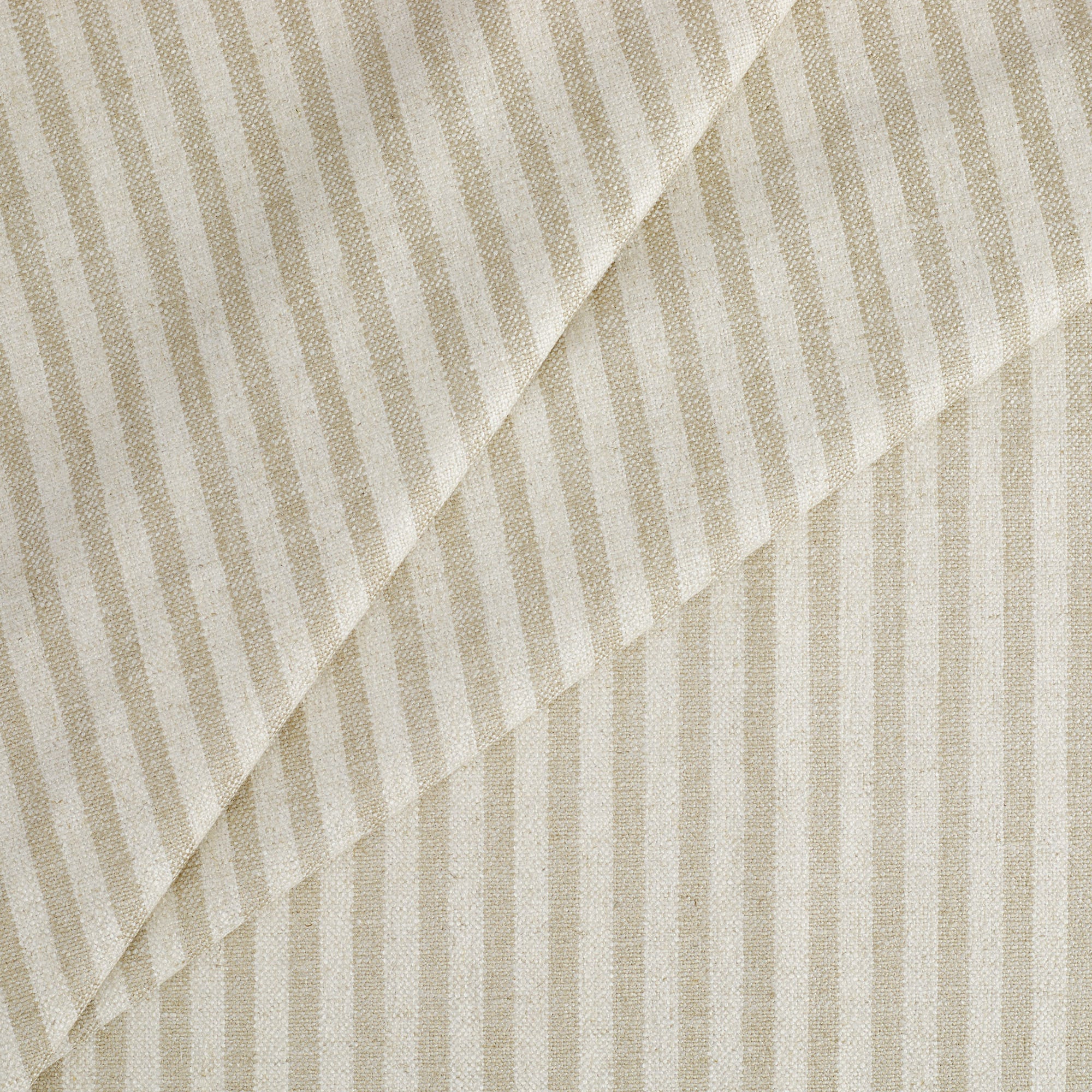 Tonic Living Somerset Stripe Oatmeal upholstery fabric featuring a classic sand and beige striped design.