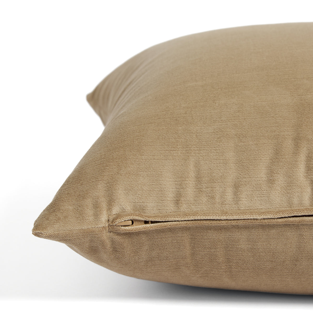 Side zipper detail of Tonic Living Sterling Velvet 20x20 pillow in soft tobacco brown velvet.