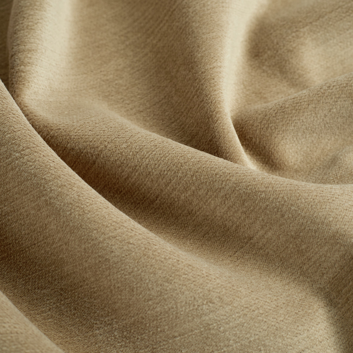 Close up of Tonic Living Sterling Velvet Bark fabric showing tobacco brown velvet, fine linear texture, and bronzed colour variation.