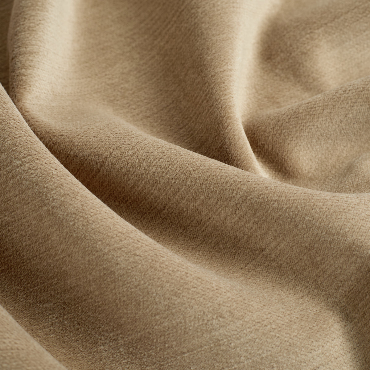 Close up of Tonic Living Sterling Velvet Bark fabric showing tobacco brown velvet, fine linear texture, and bronzed colour variation.