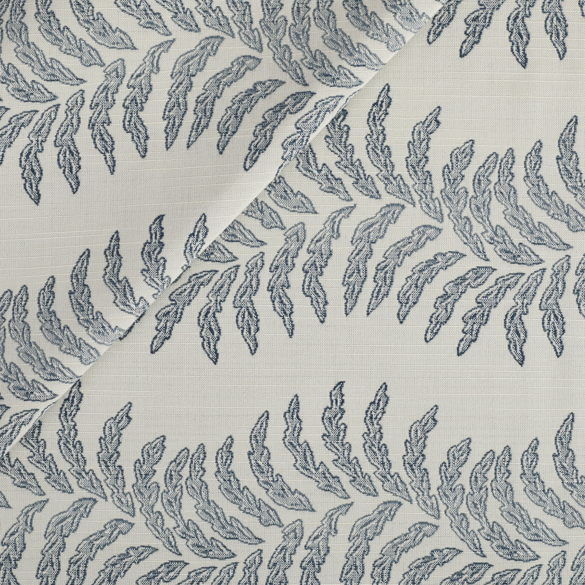 Tonic Living Swoon Sunbrella Outdoor Fabric in Denim, a blue and white indoor/outdoor upholstery fabric with a botanical stripe.
