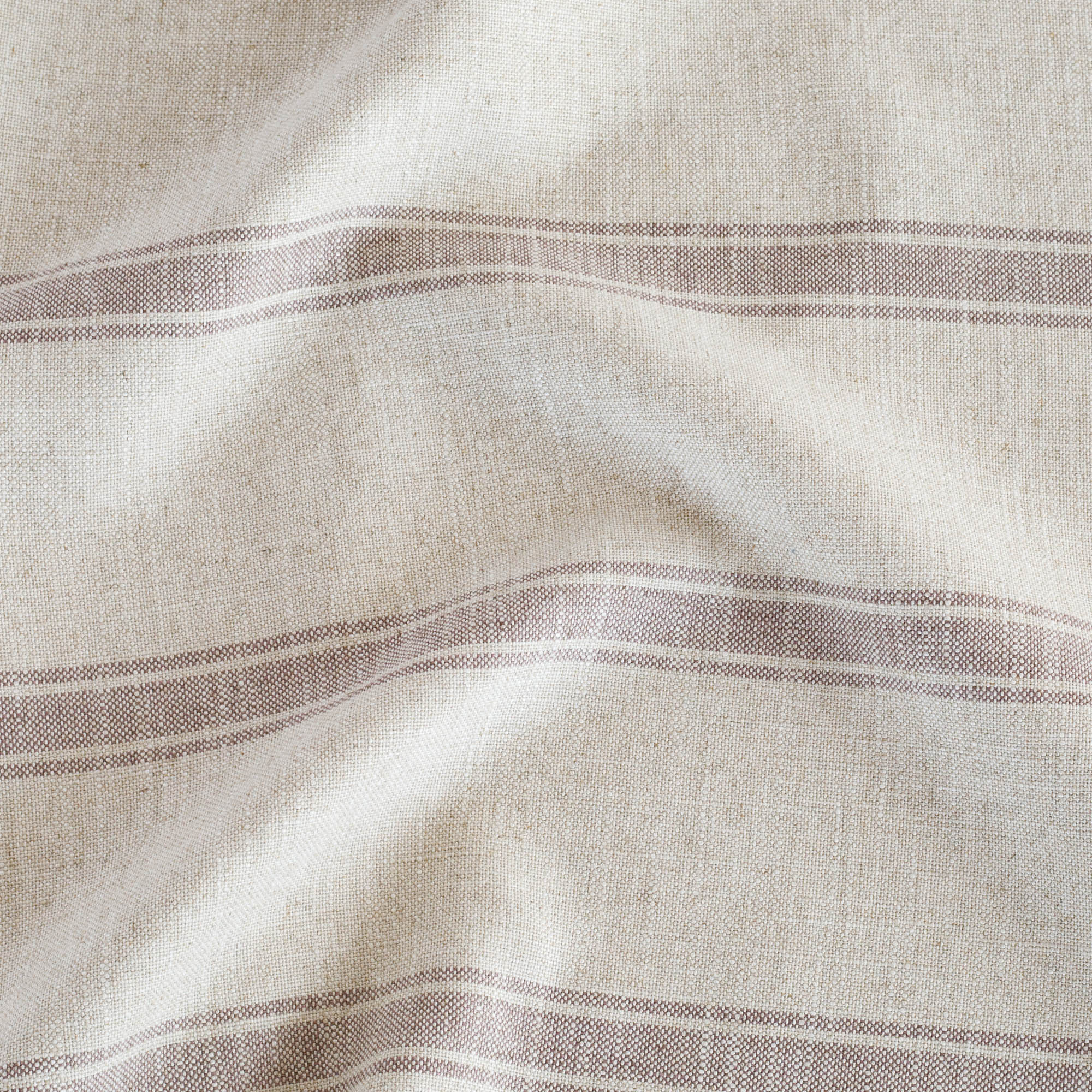Theo Stripe Fabric Mauve, an oatmeal and soft purple linen blend stripe fabric from Tonic Living