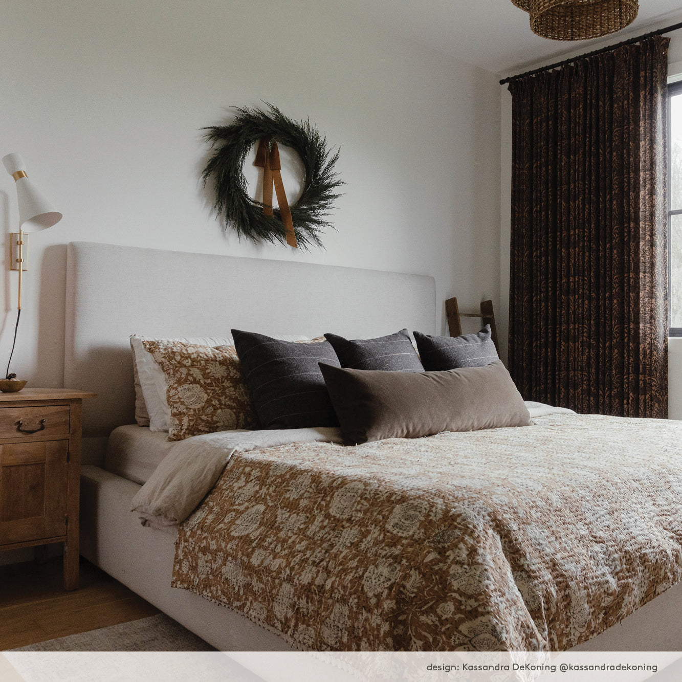 A moody living room styled with wool and velvet neutral decorative bed pillows from Tonic Living.