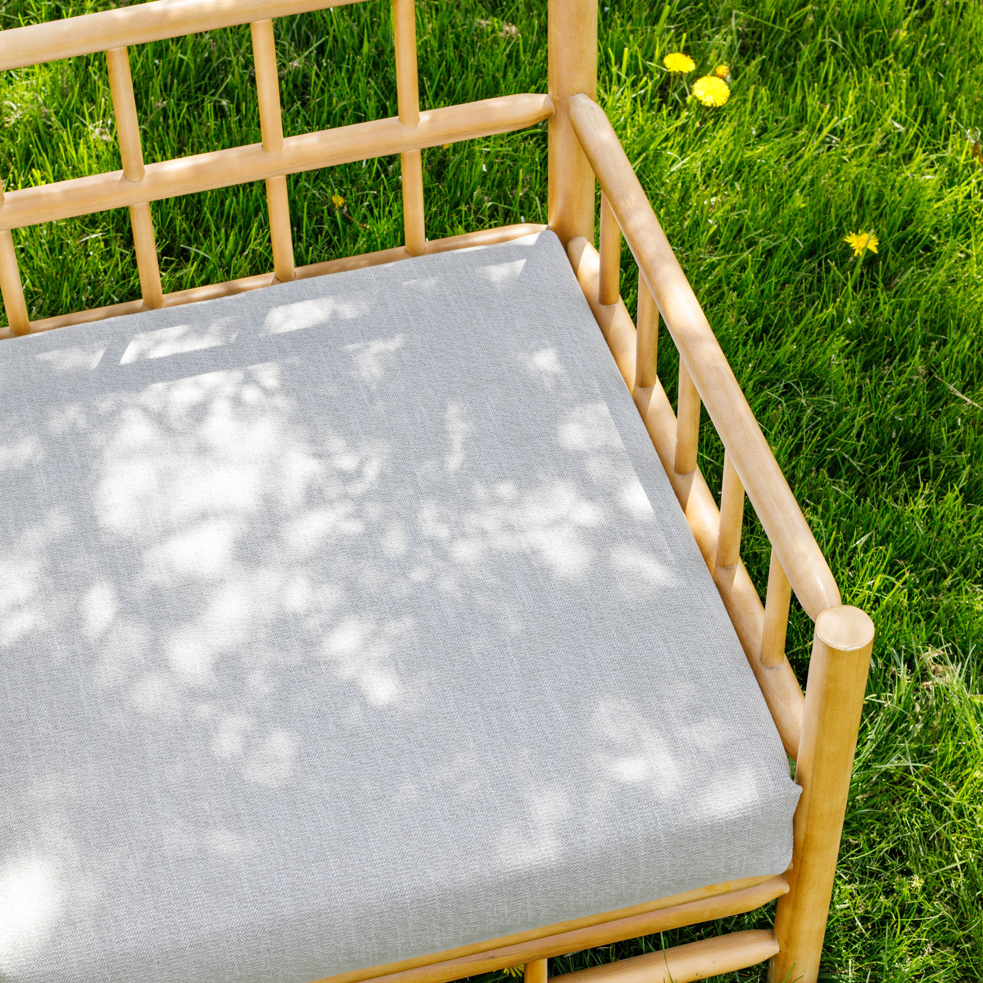 an oatmeal beige outdoor upholstery fabric bench cover