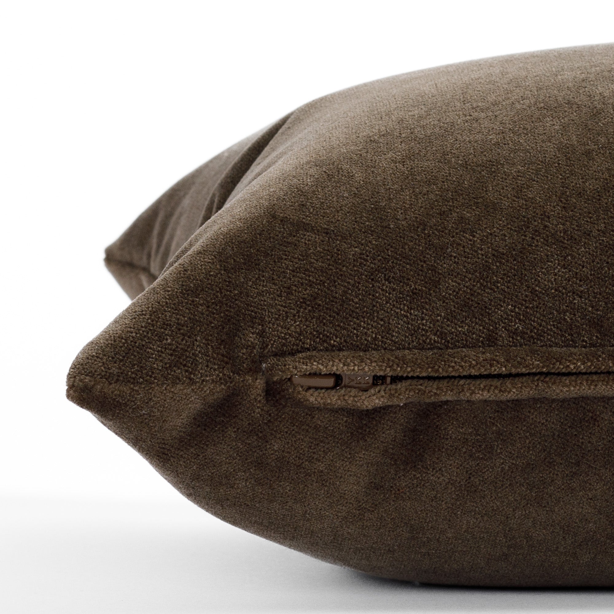 a rich brown lumbar: close up zipper view