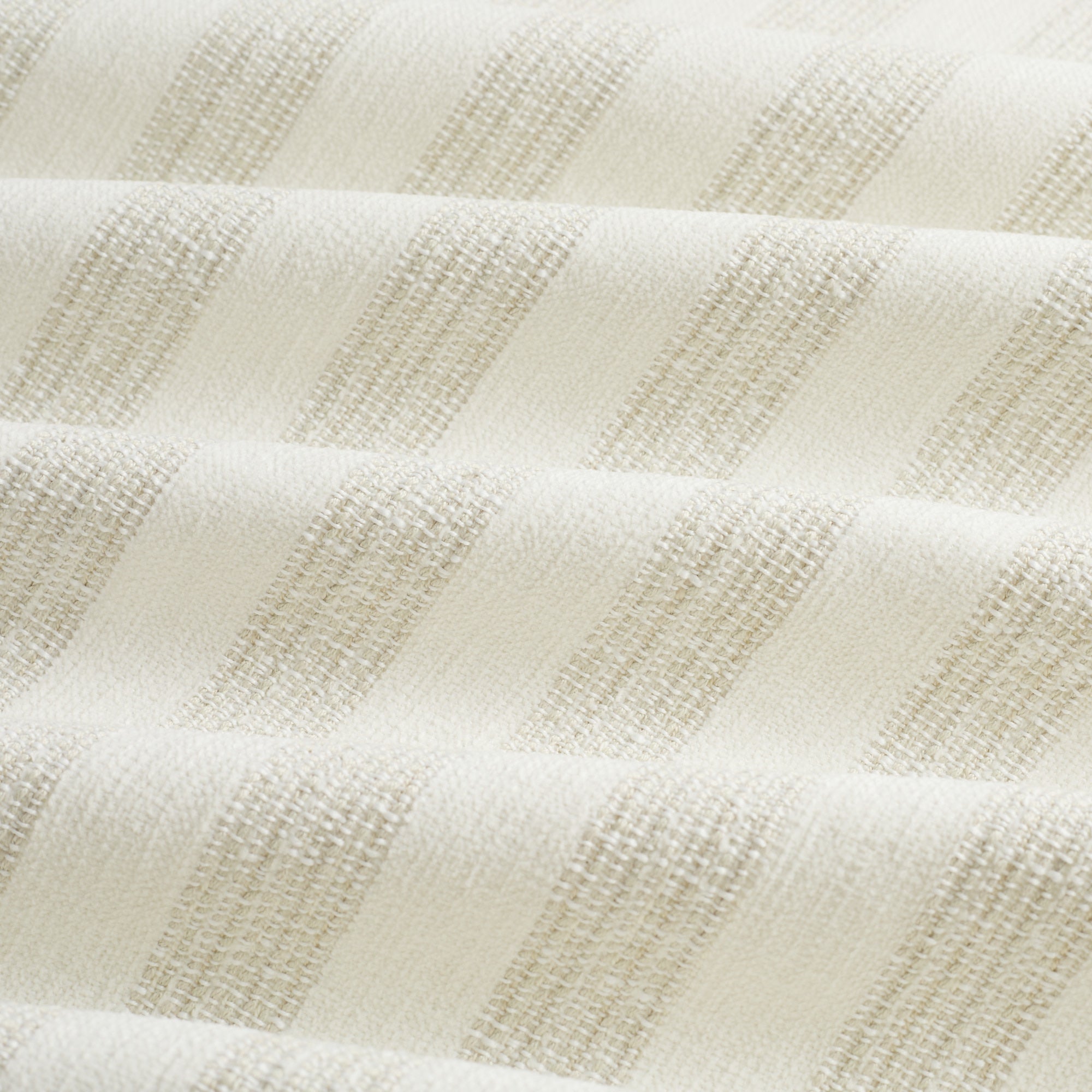 Tonic Living Vera InsideOut Pearl indoor/outdoor upholstery fabric with a refined tone-on-tone striped design.