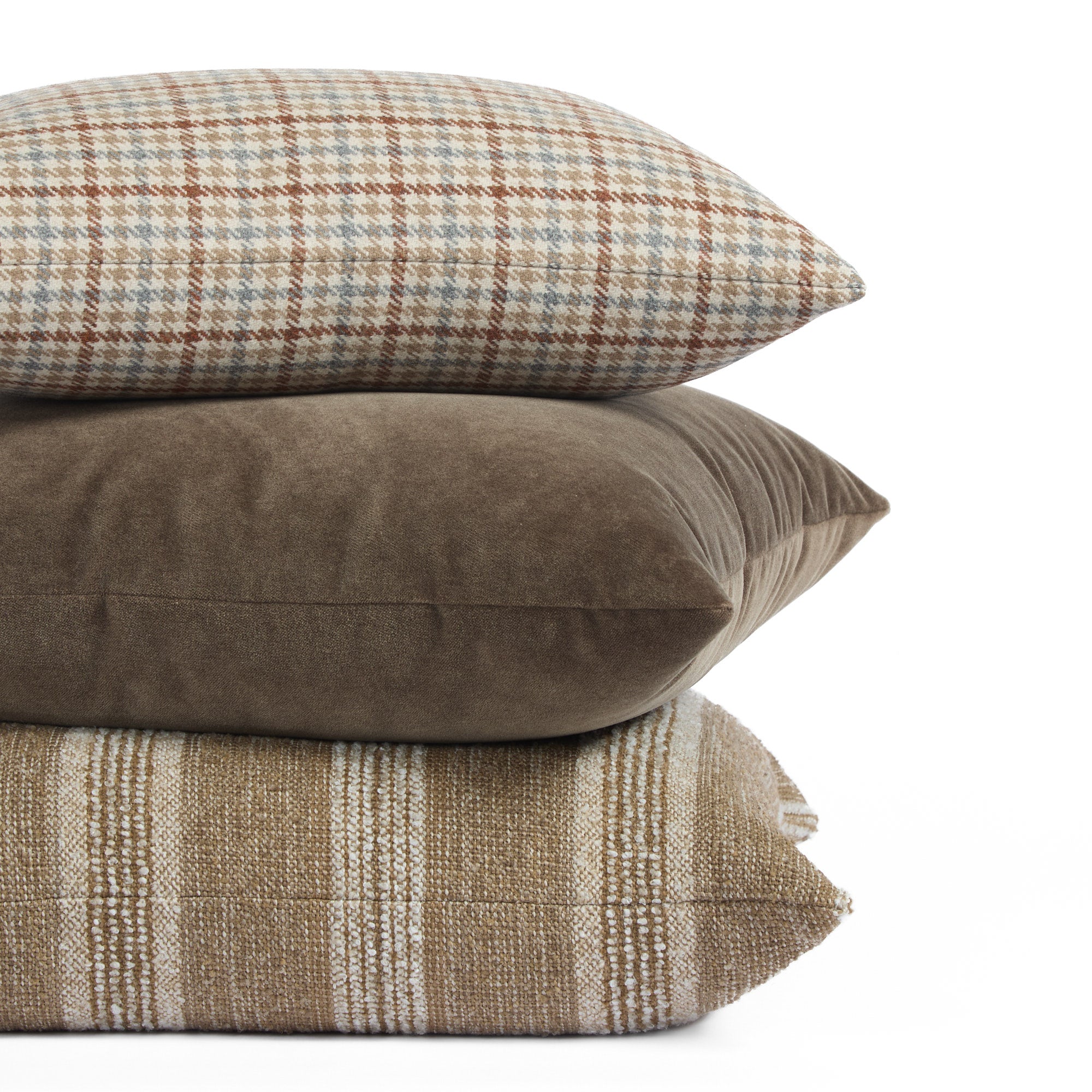 Stack with Vesper Plaid 14x20 lumbar pillow, Valentina Velvet Truffle 20x20, and Acadia Stripe Cinnamon 22x22.
