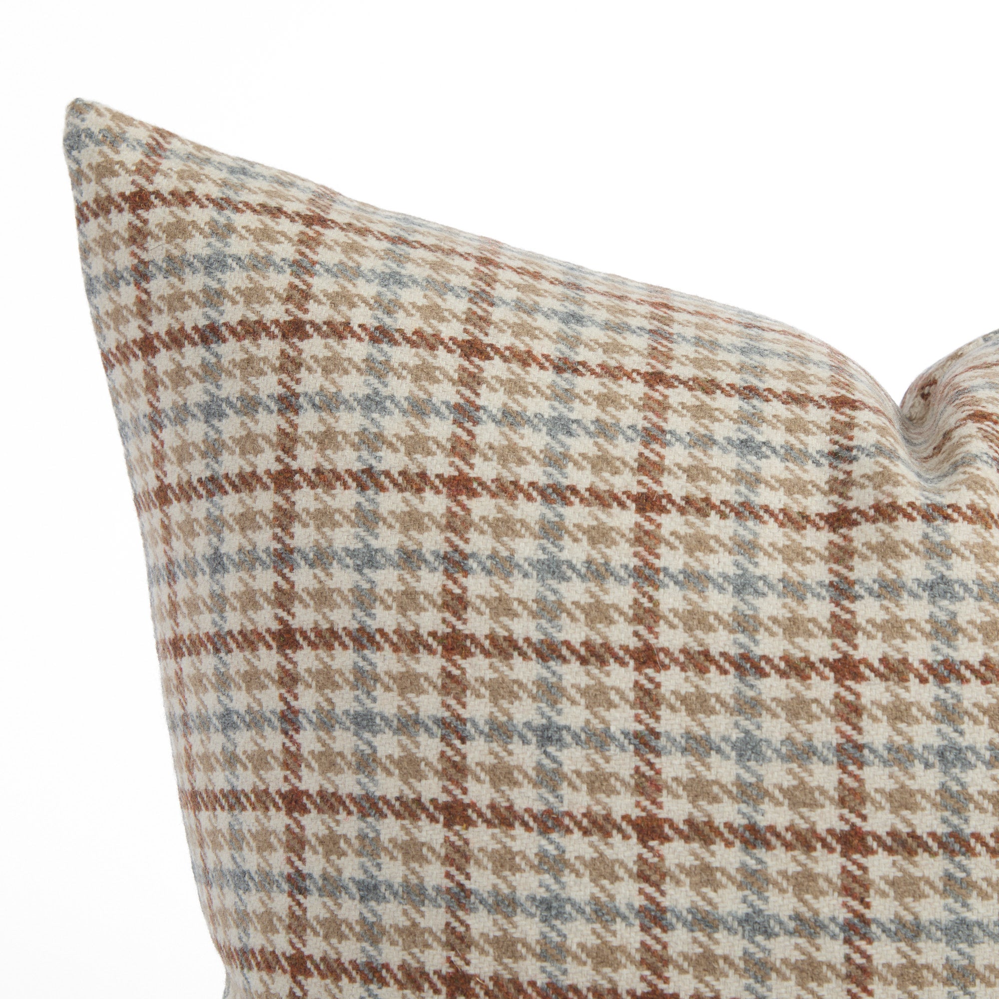 Close up of Vesper Plaid houndstooth decorative cushion in beige, chambray blue, and cinnamon by Tonic Living