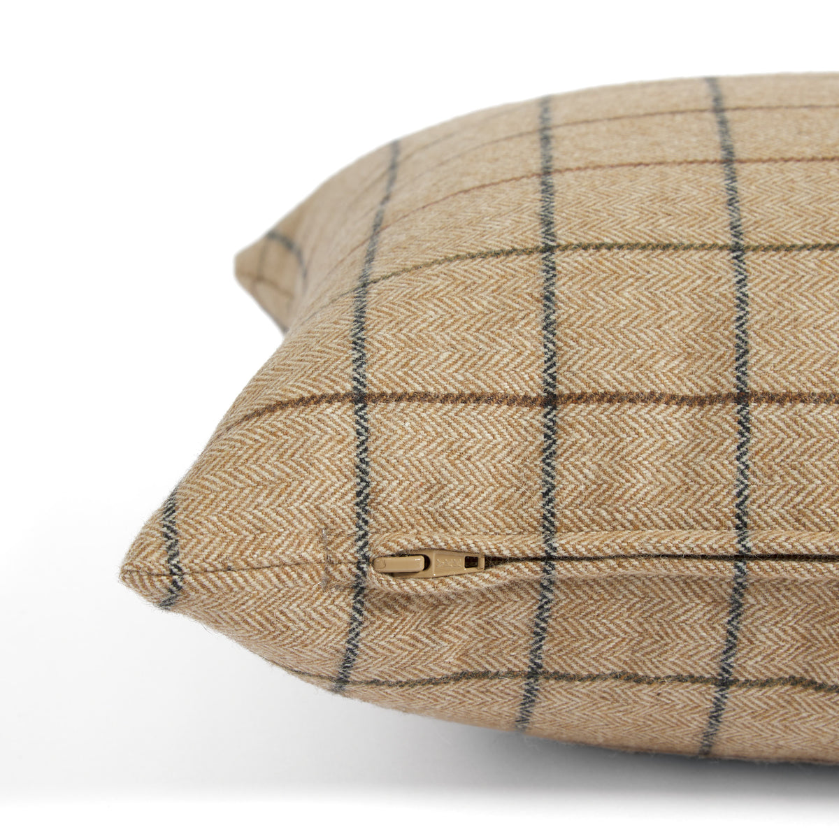 Side zipper detail of Tonic Living Walker Plaid 14x20 lumbar pillow in a light brown windowpane check.