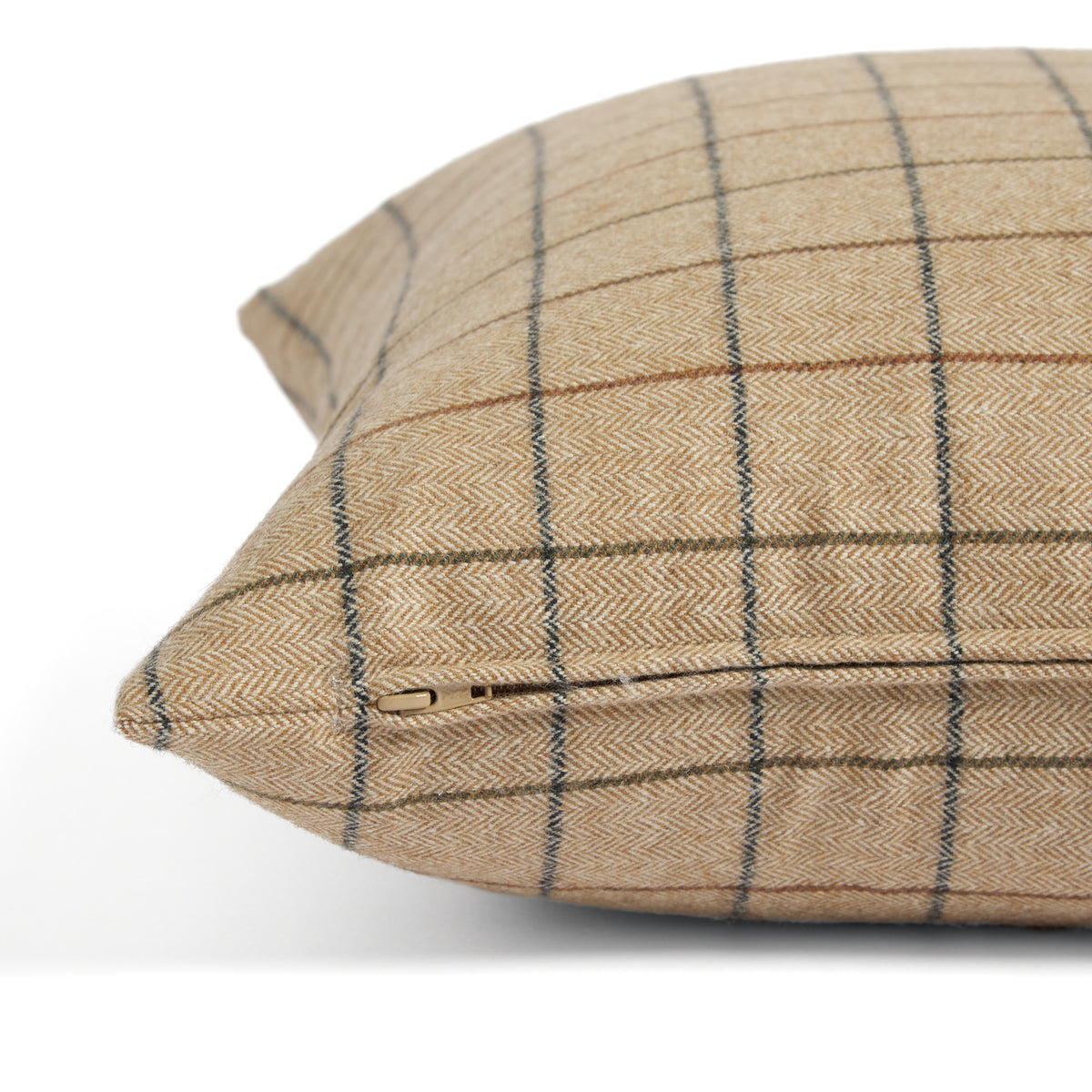 Side zipper detail of Tonic Living Walker Plaid 20x20 pillow in a camel brown windowpane check.