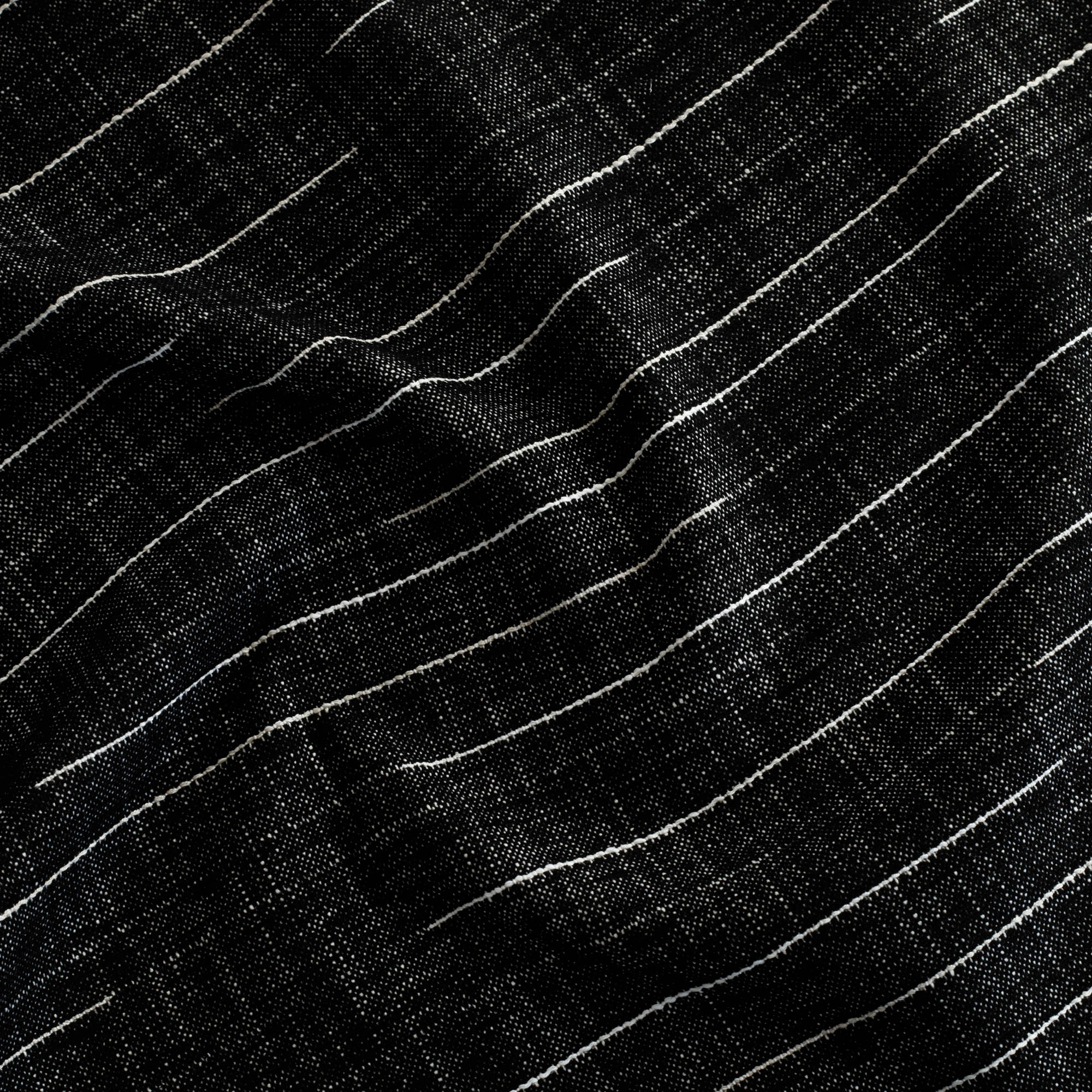 Yuzu Onyx InsideOut Fabric, a black and white striped upholstery fabric from Tonic Living.