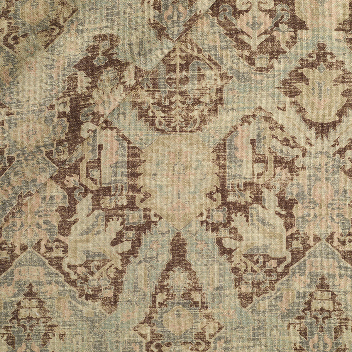Tonic Living Zuri Fabric in Driftwood, a distressed ornamental medallion fabric with a faded, antique-inspired look.