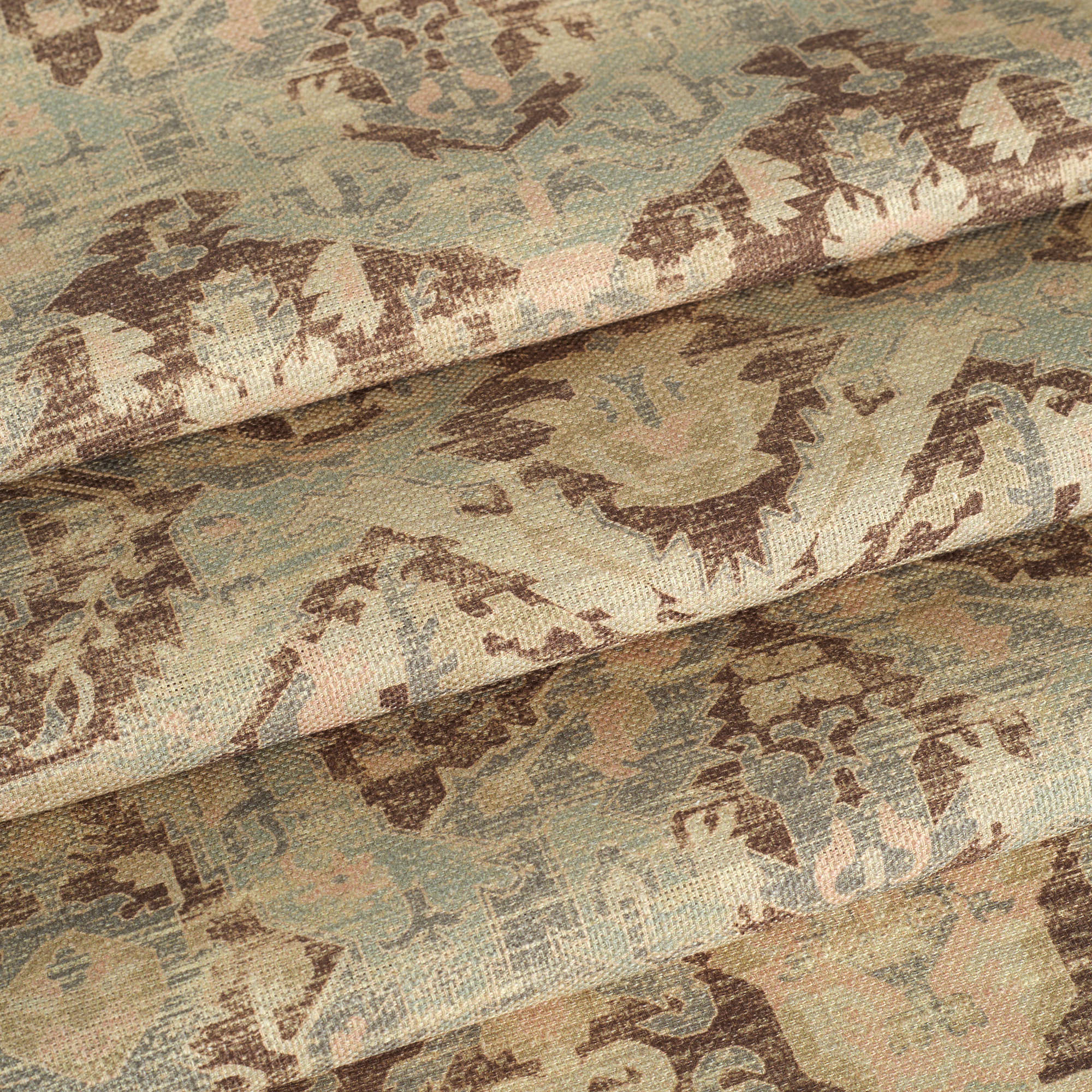 Tonic Living Zuri Driftwood fabric shown as Roman shades featuring a distressed ornamental medallion design.