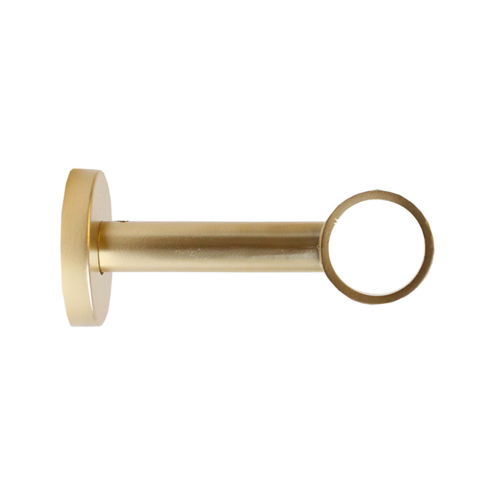Fully enclosed old gold wall bracket drapery hardware from Tonic Living