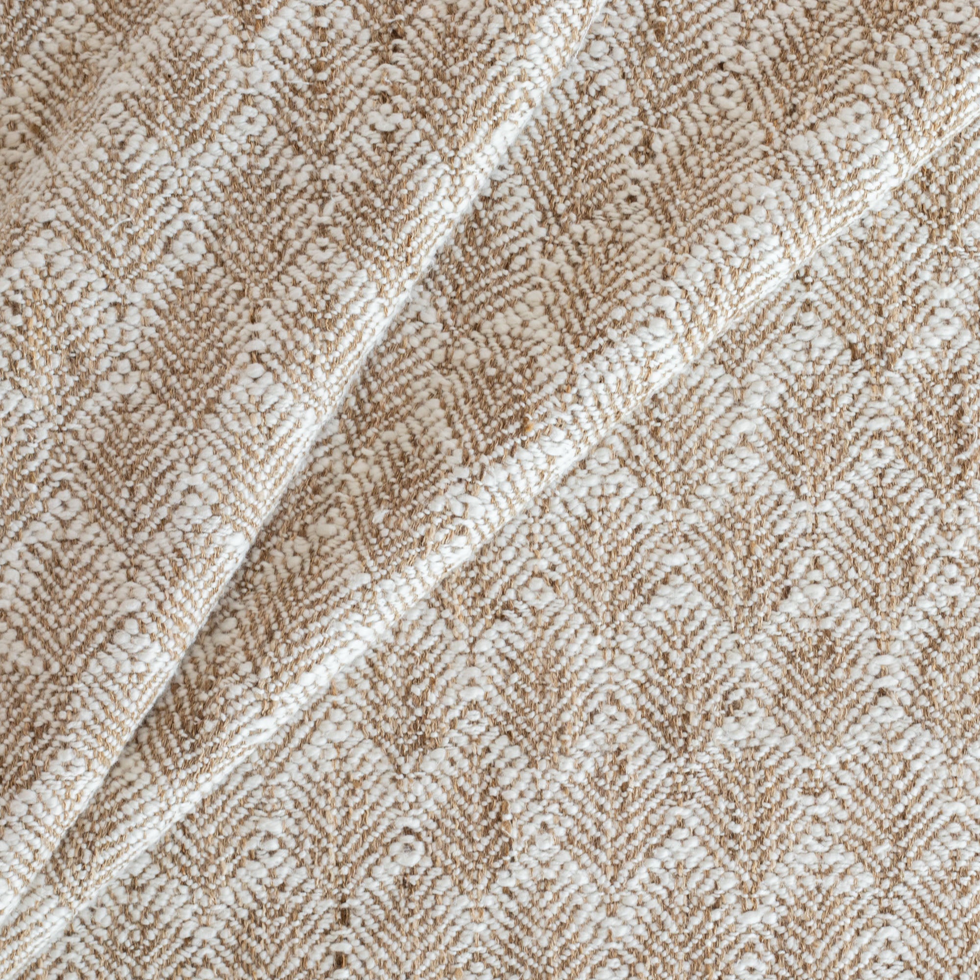a cream and light brown wheat sheaf pattern upholstery fabric