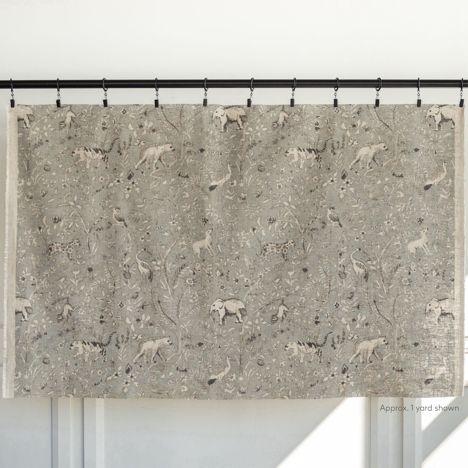 a grey botanical and exotic animal patterned home decor fabric from Tonic Living : 1 yard cut