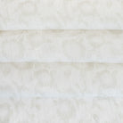 a cream white and beige floral print sheer linen fabric