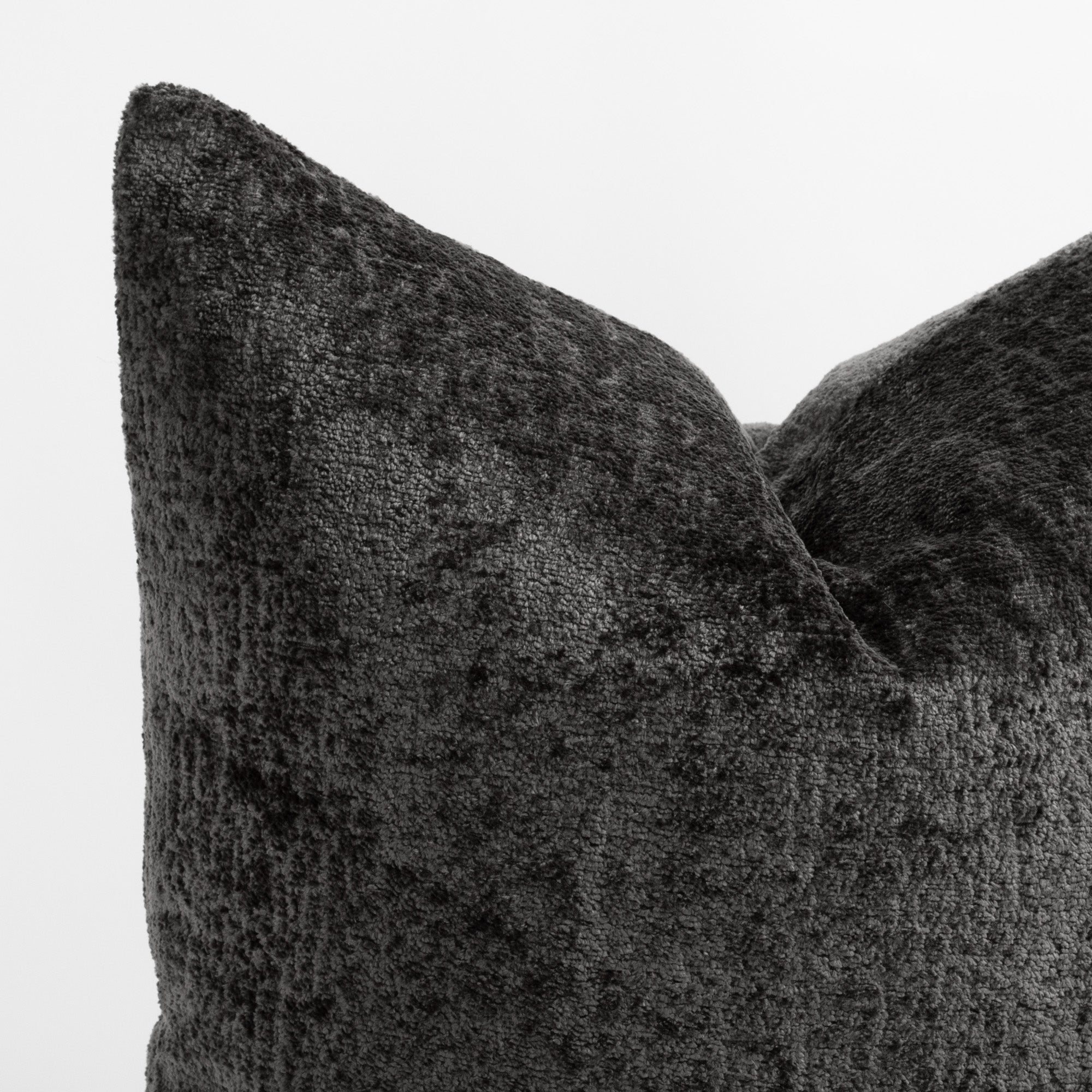 Ginsberg Velvet 22x22 Pillow Pewter, a charcoal grey velvet pillow : close up corner