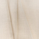 Grange Fabric Parchment, a high performance sandy beige upholstery fabric: close up view