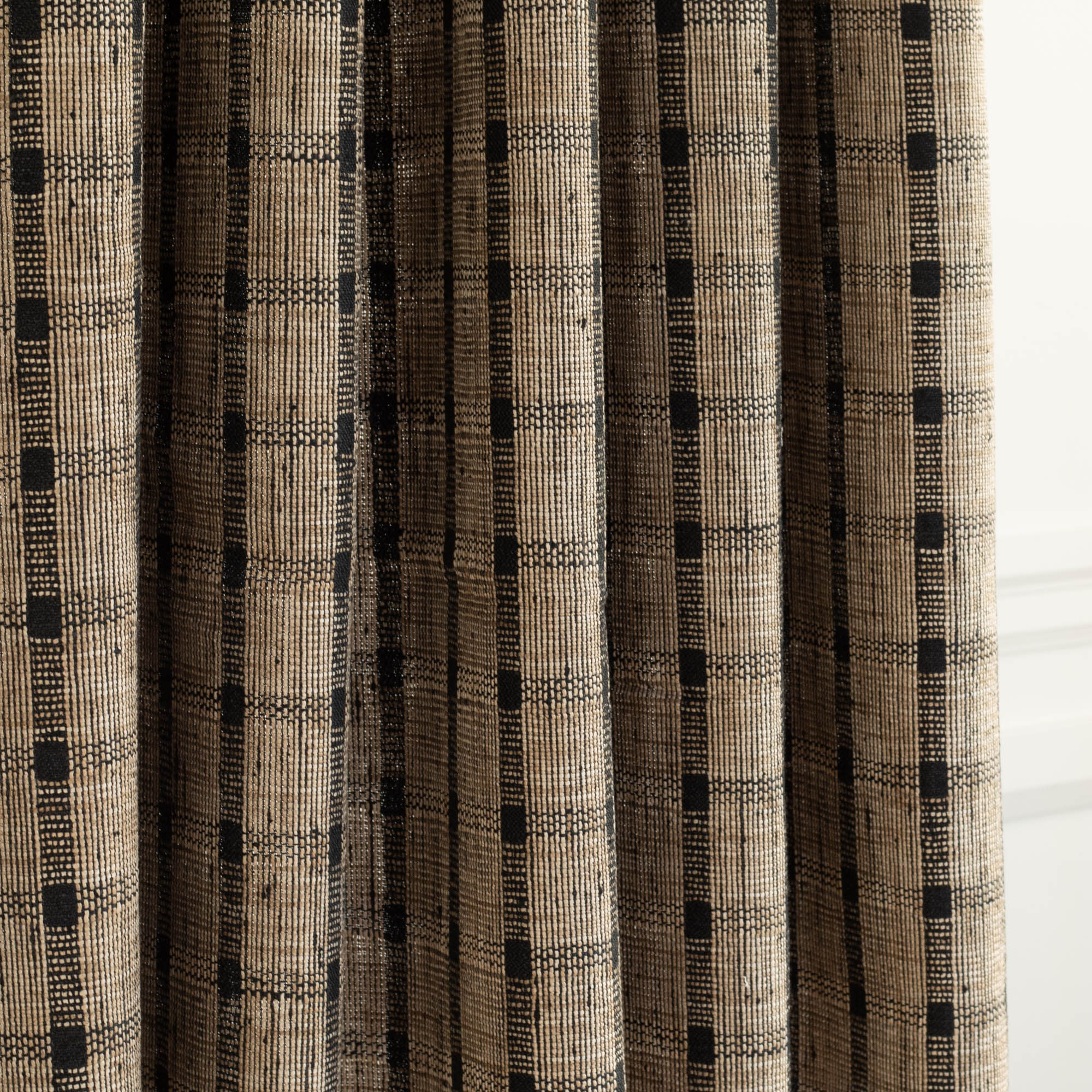 a tan brown and black plaid check curtain fabric