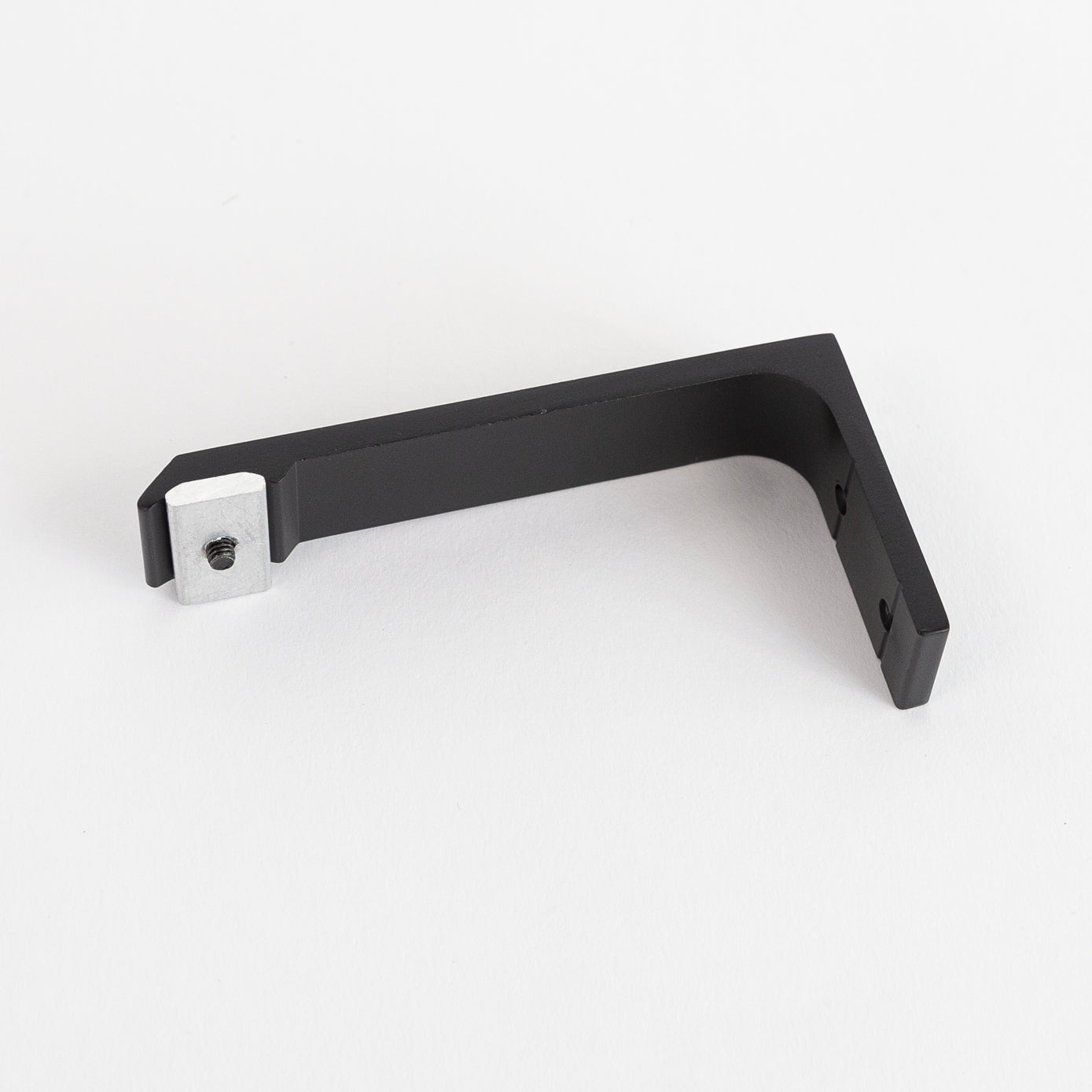 Channel Track Wall Bracket Flat, a sturdy, minimal black wall bracket for channel track drapery rods