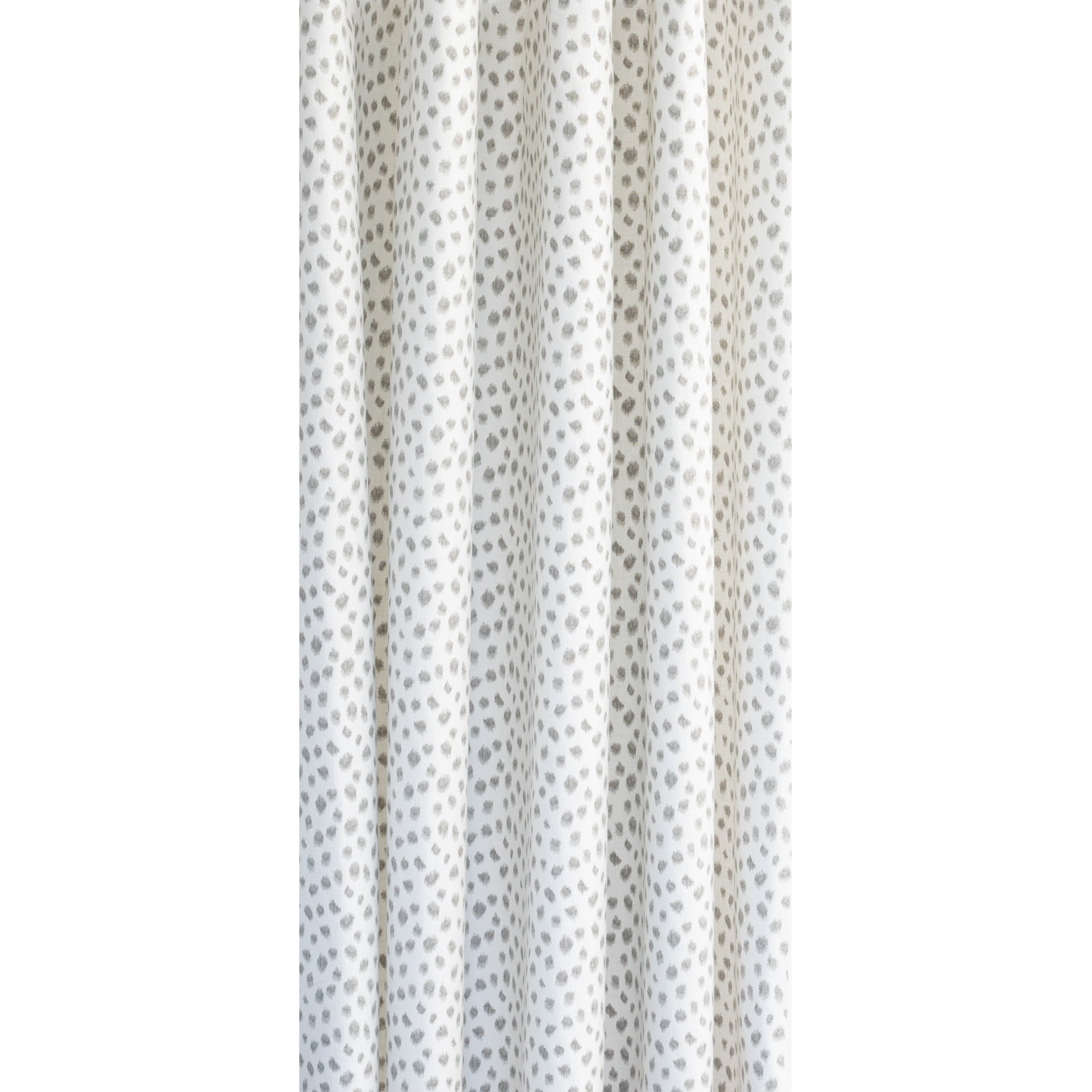 Mara Spot, a white and soft grey dot print drapery fabric