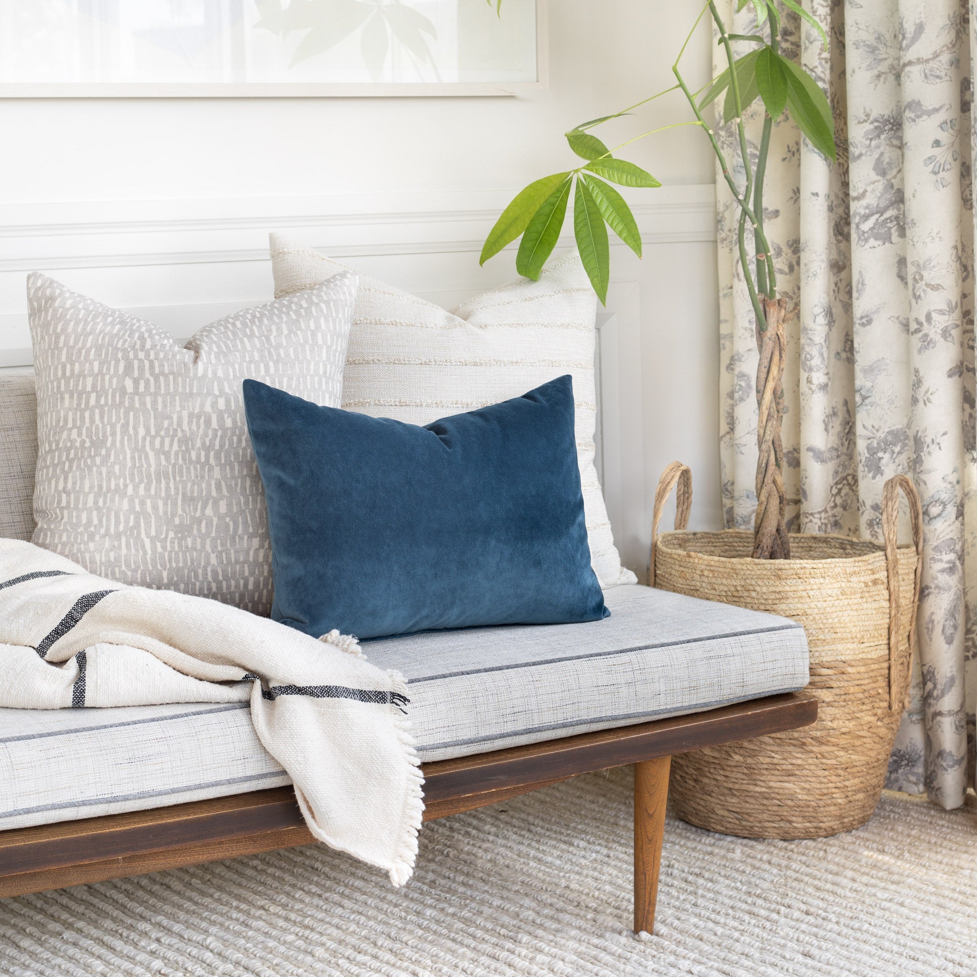 Sofa pillow combination: Mason Velvet Lakeland Blue lumbar pillow, Avareno Silver, Handlavet Raffia pillow
