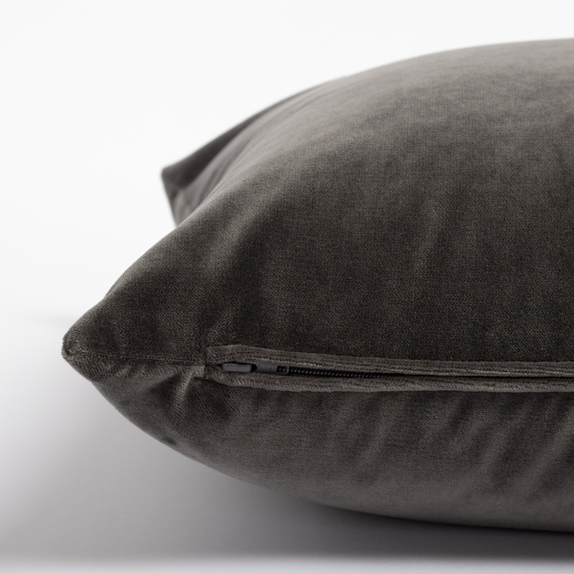 Mason Velvet Shale, a deep grey velvet pillow : close up zipper view