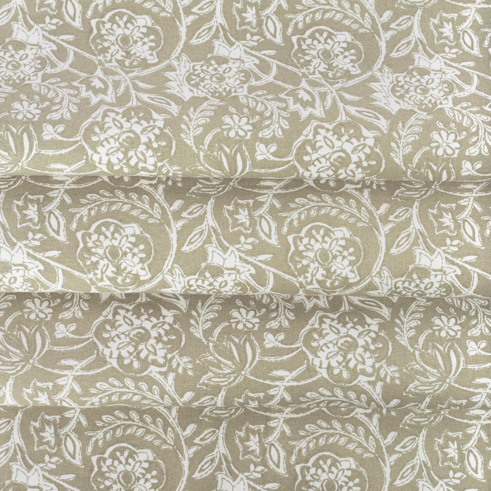 Padma Sand, a khaki beige and cream tapestry block print style cotton fabric: close up view