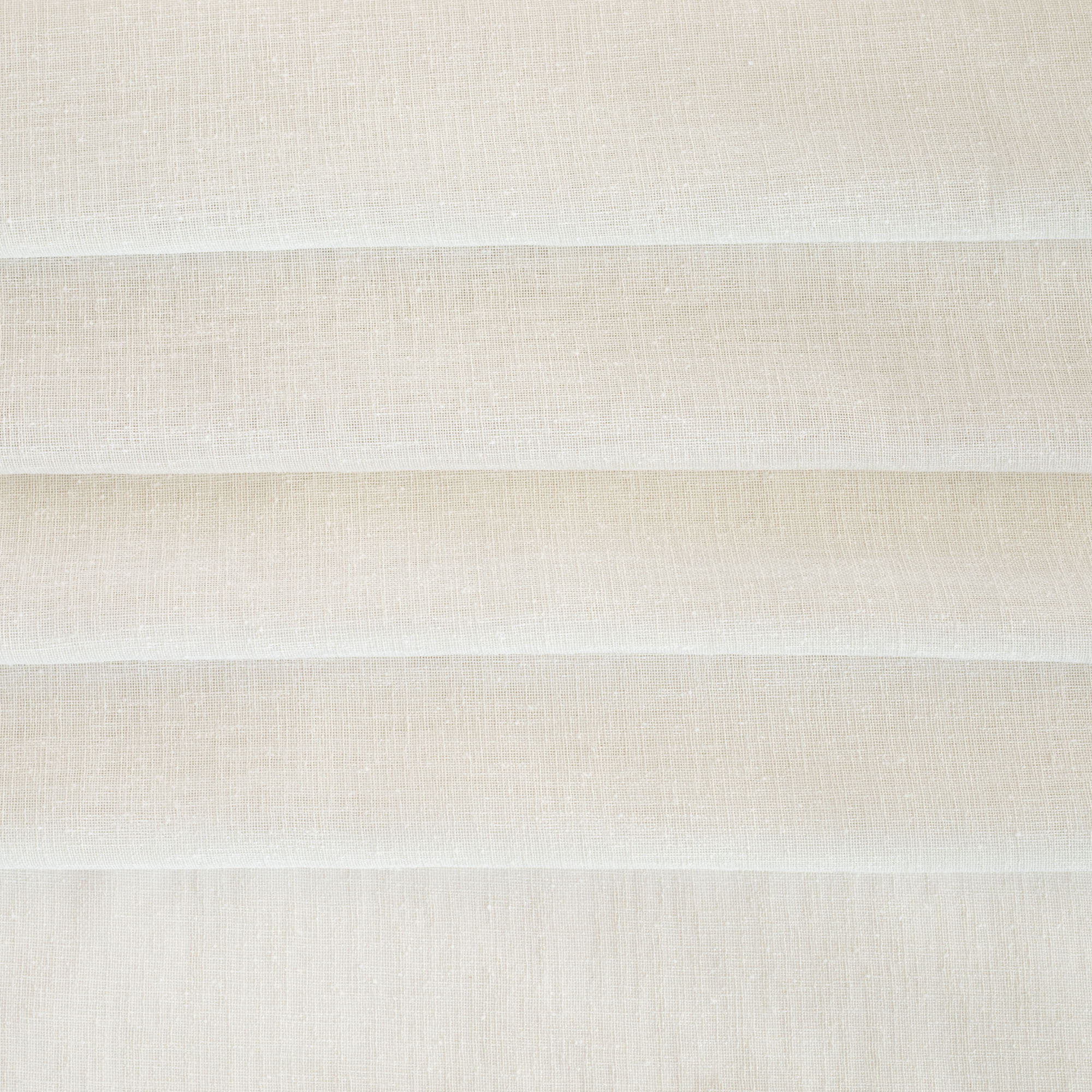 an off white sheer curtain fabric