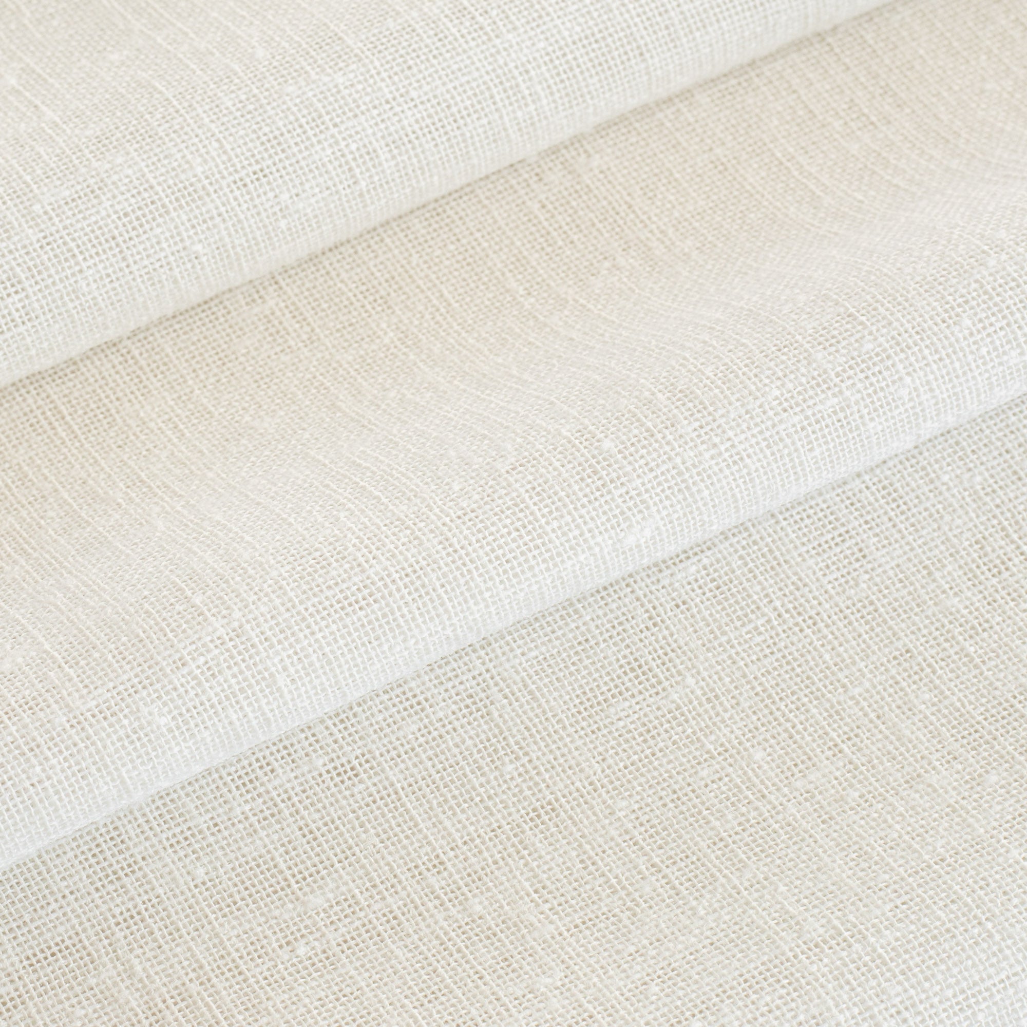 a cream white sheer curtain fabric