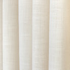 Peyton Pearl, a creamy off-white semi-sheer drapery fabric from Tonic Living