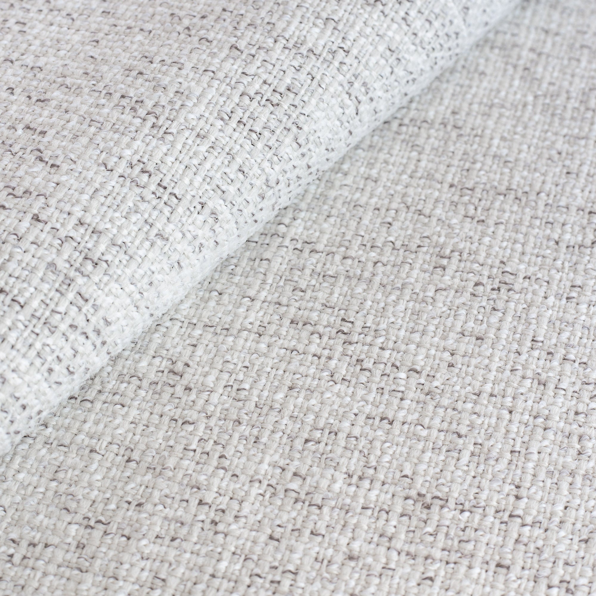 Preston Birch, a light cream with strands of warm grey performance upholstery fabric