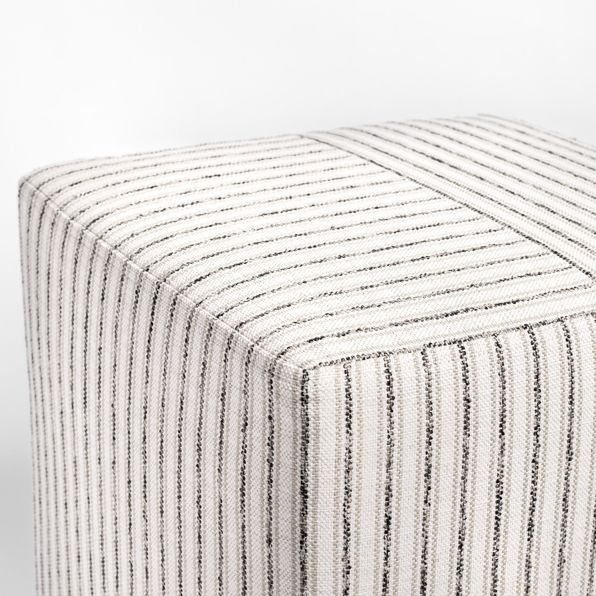 Rodin Stripe cube ottoman, a beige, ivory and grey stripe ottoman : close up of top corner