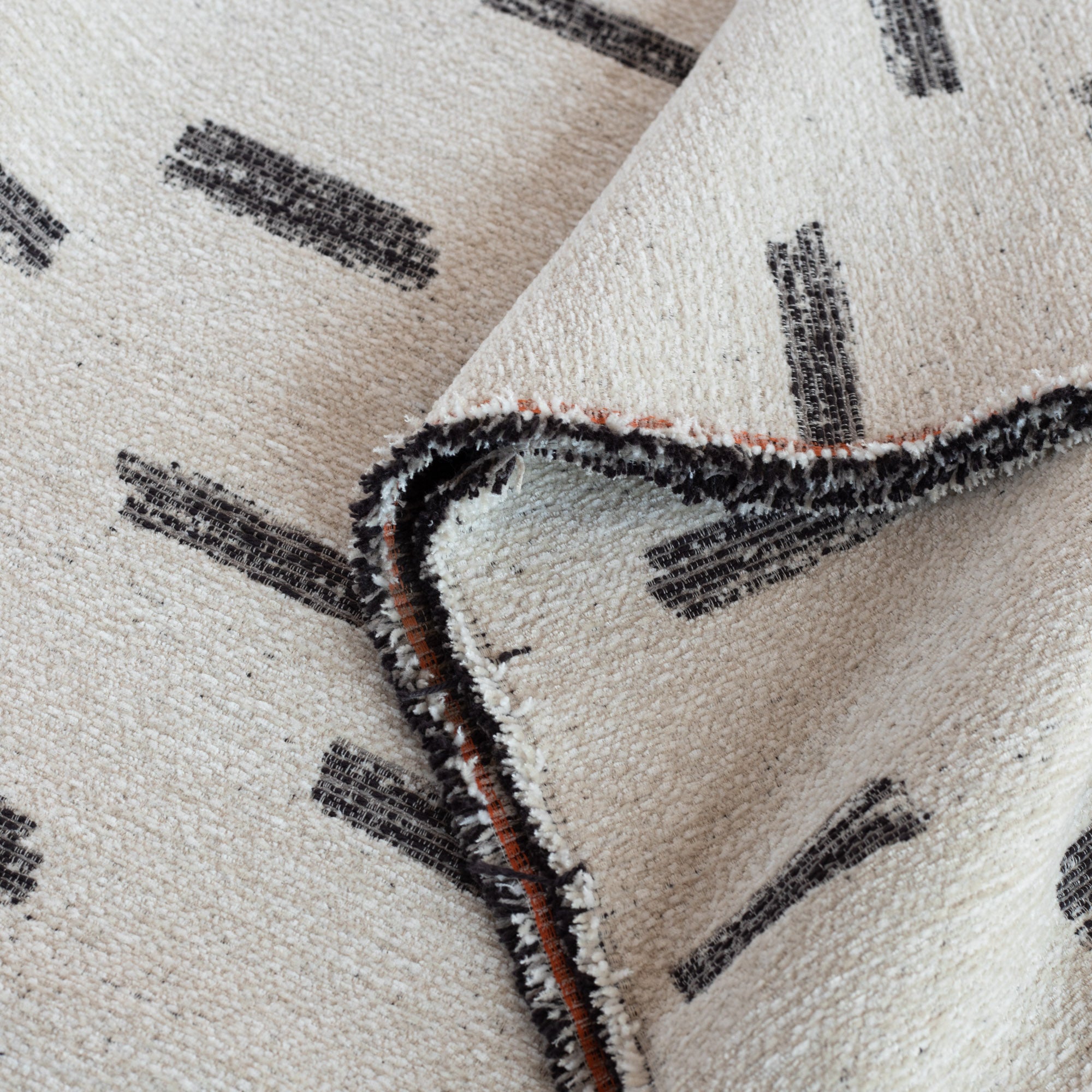 Stratus Fabric Cream, a cream upholstery fabric with an abstract black brush stroke pattern : view 4