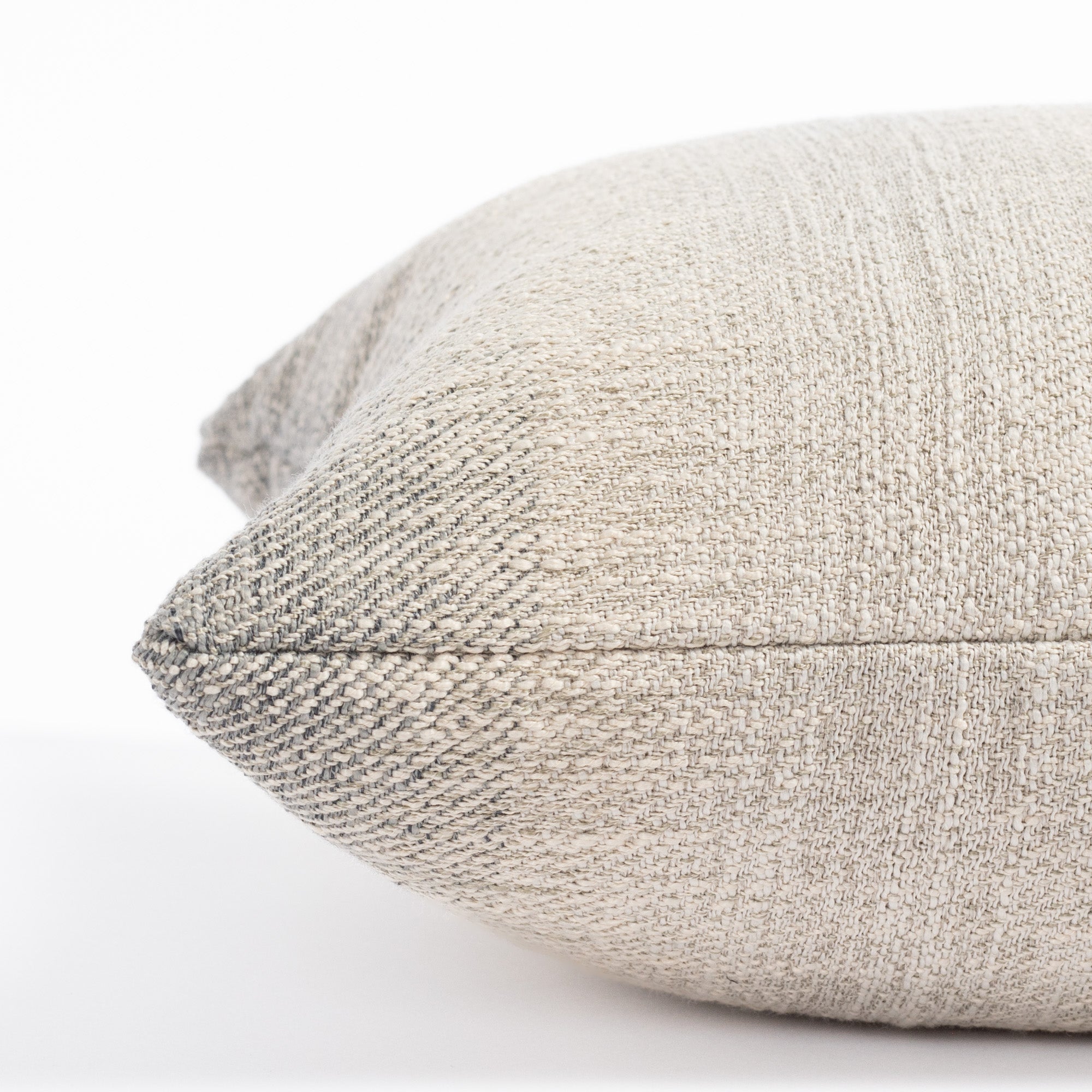 a smokey blue and sandy grey ombré stripe throw pillow : close up side view