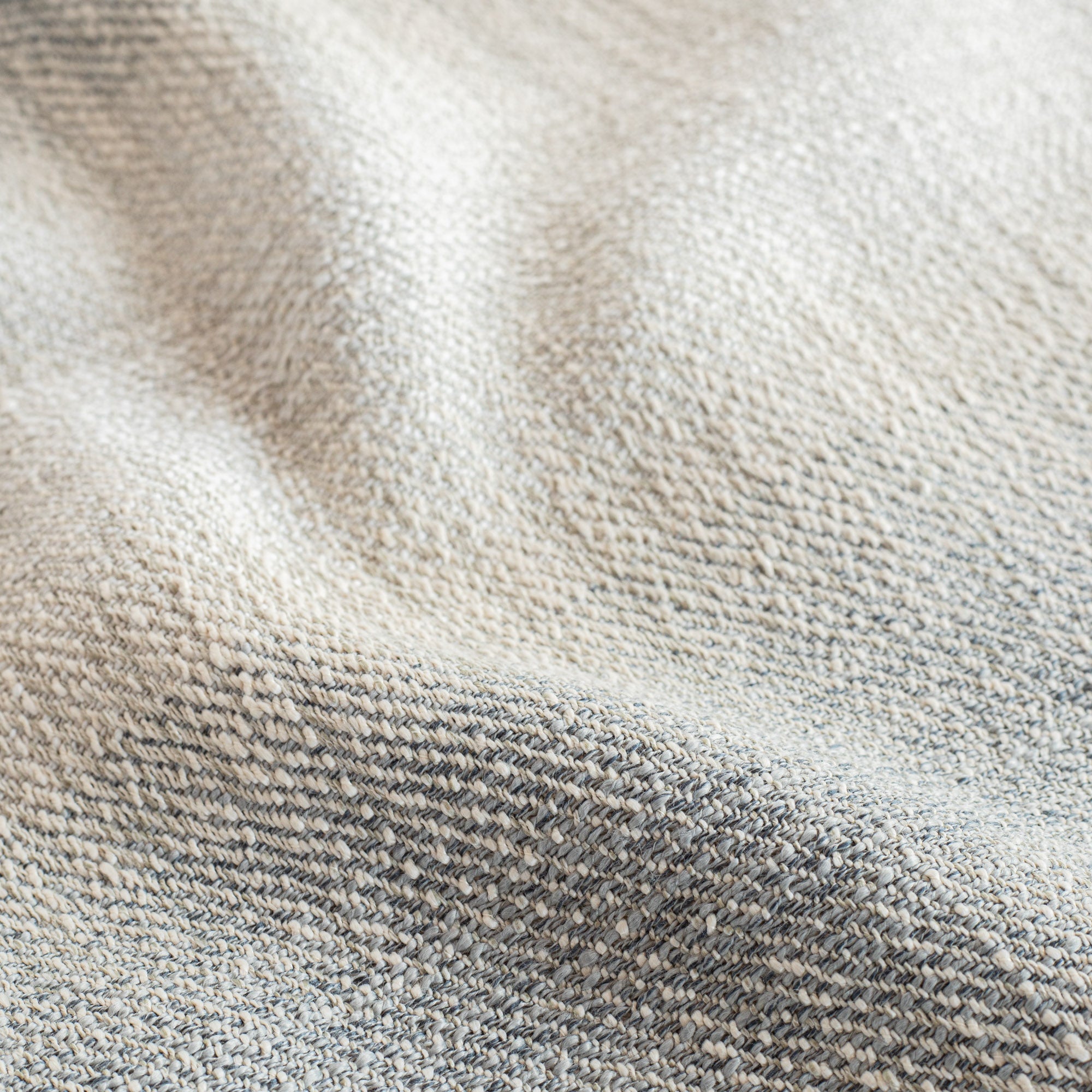 a denim blue and sandy grey ombre stripe home decor fabric