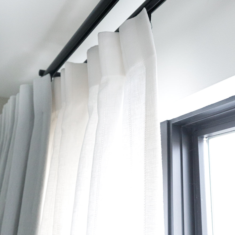 Channel Track Drapery Rod, a heavy duty black metal drapery rod from Tonic Living