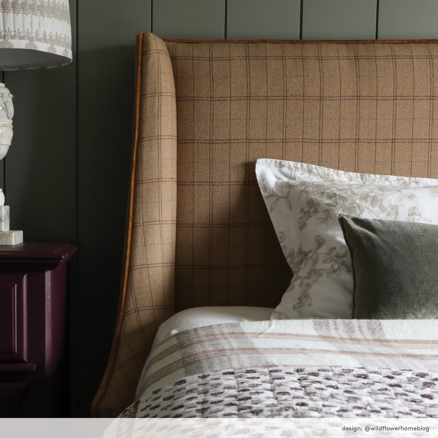 camel plaid upholstered headboard in bedroom