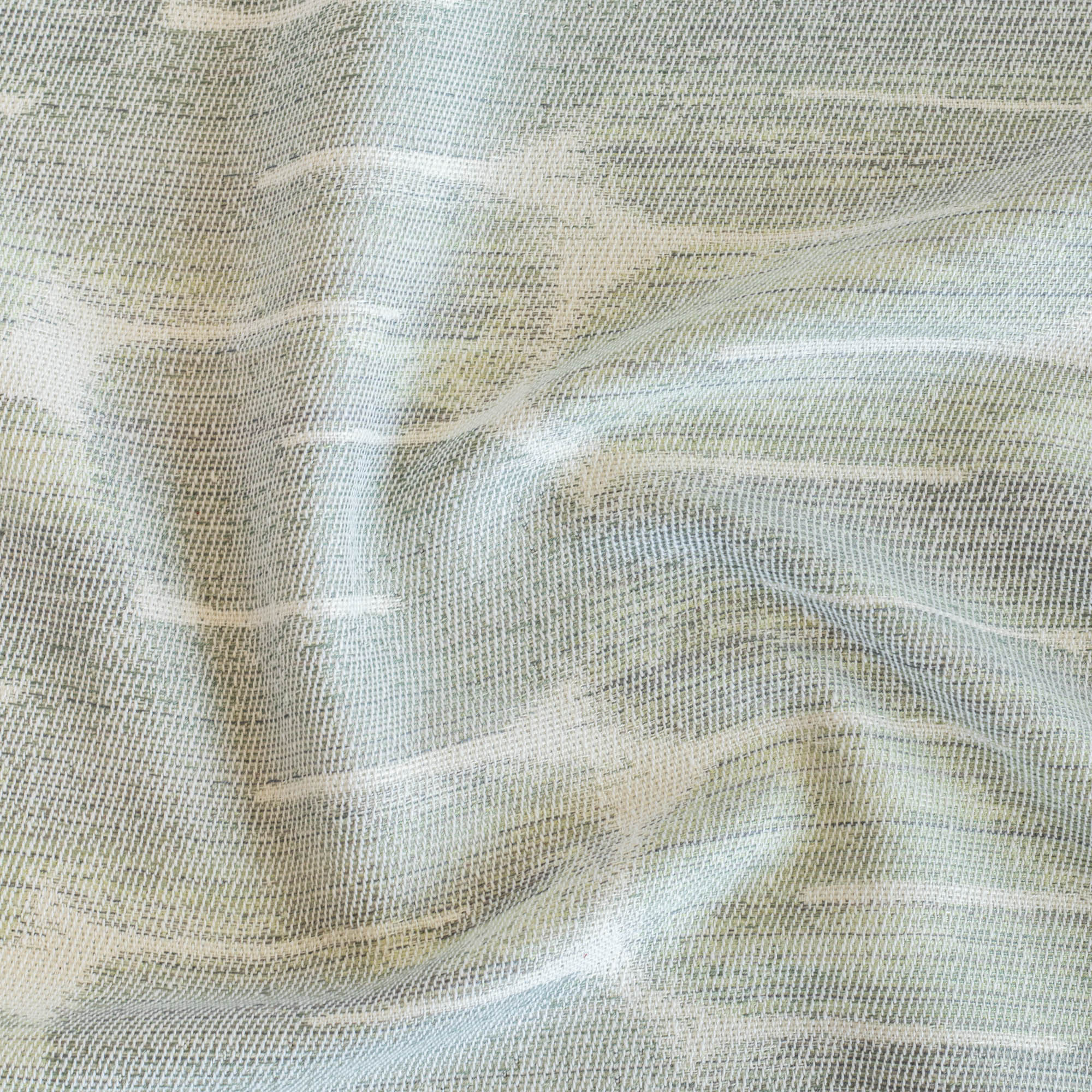 a watery blue, jade green and white swirl pattern home decor fabric