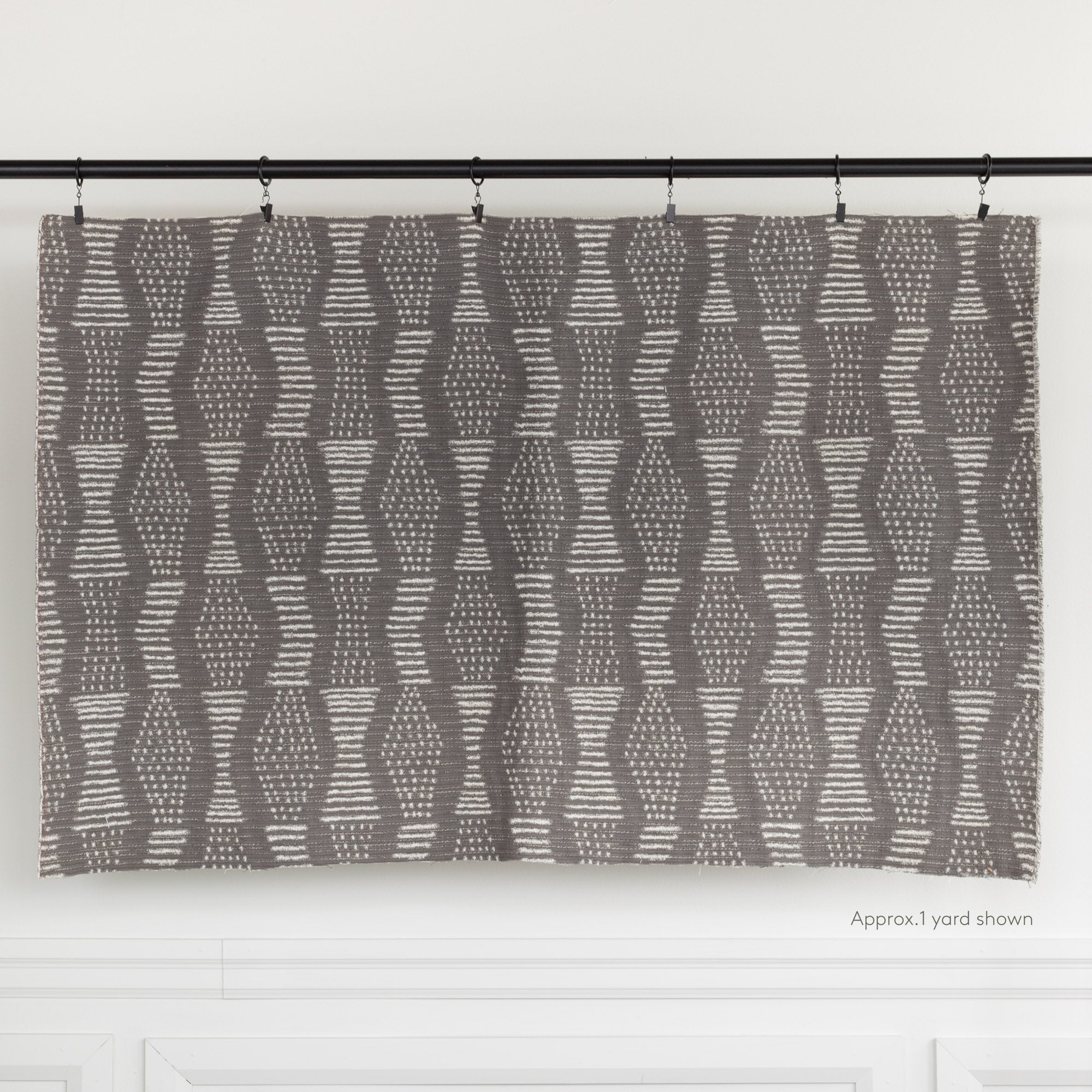 Zipporah Nickel, a dark gray upholstery fabric with cream dot dash motifs : one yard cut
