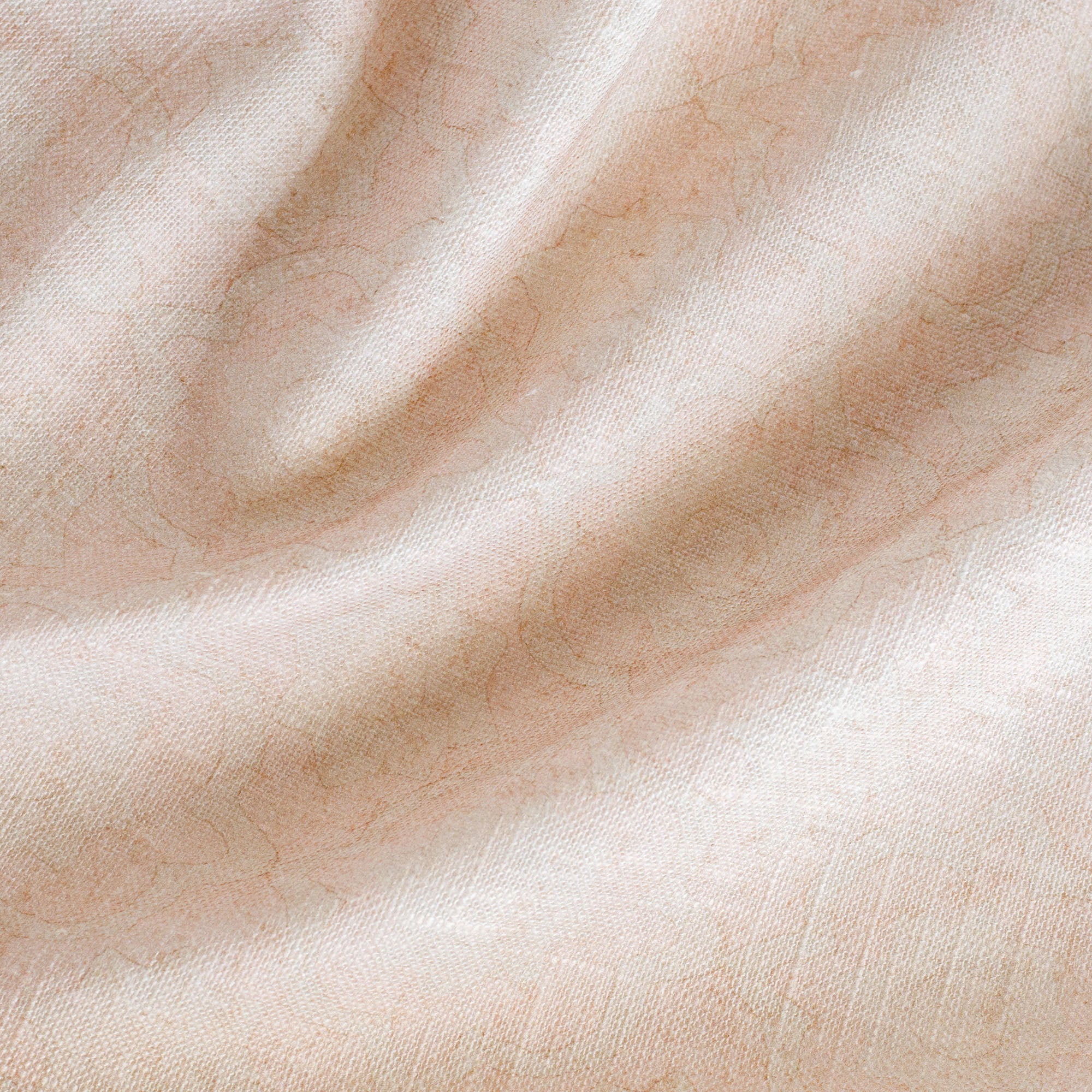 a soft pink subtle medallion pattern drapery fabric : close up view