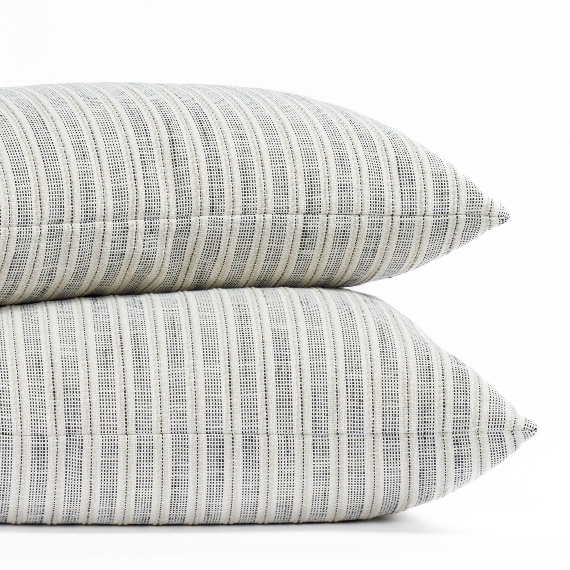 cream and black indoor outdoor pillows in two sizes