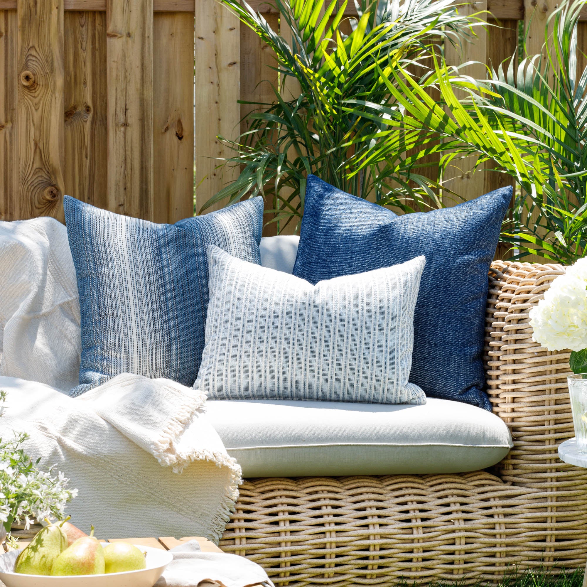 Blue and white outdoor throw pillows from Tonic Living